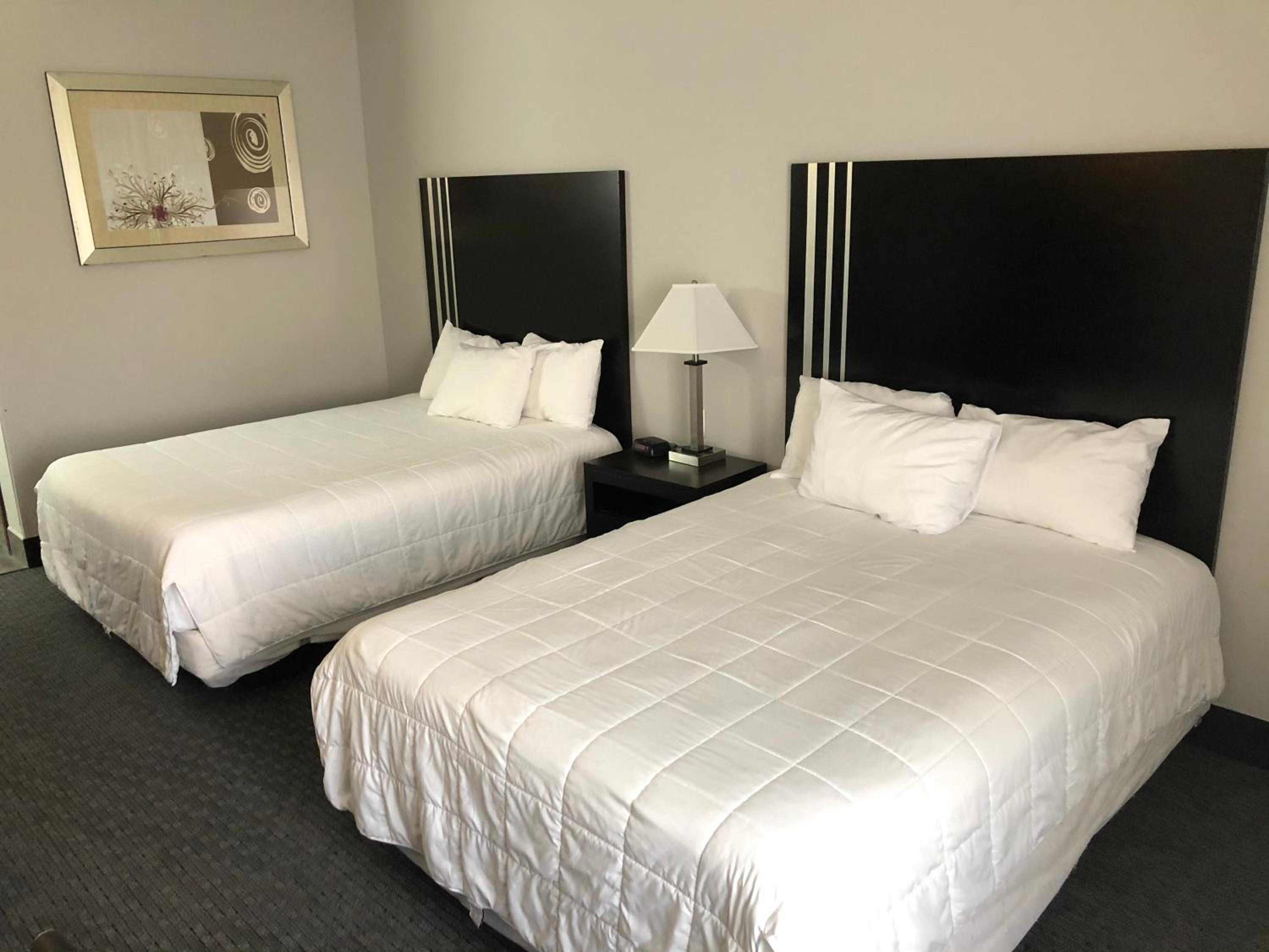 Queen Room with Two Queen Beds - Photo 1