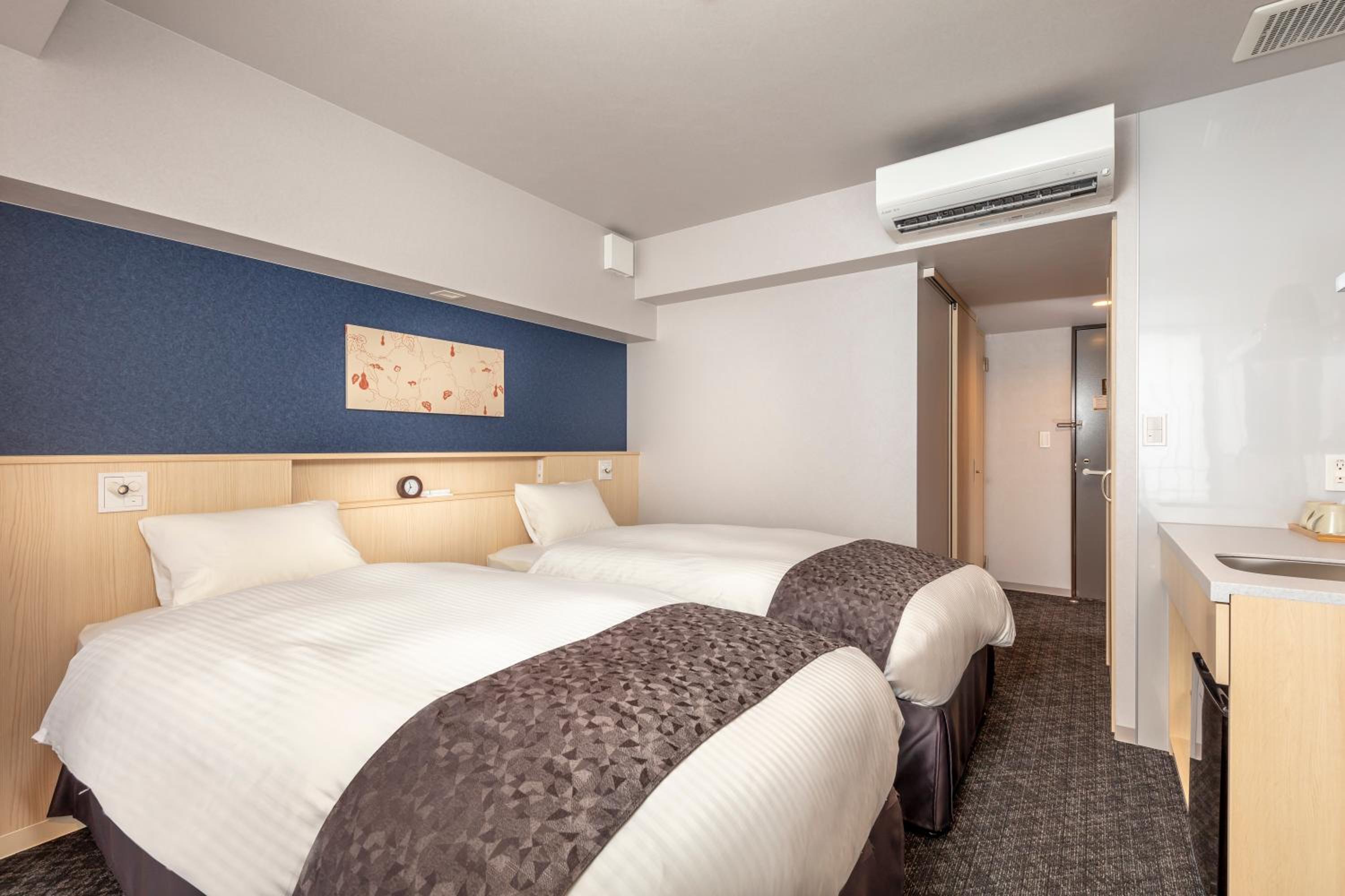 Deluxe Twin Room - Photo 13