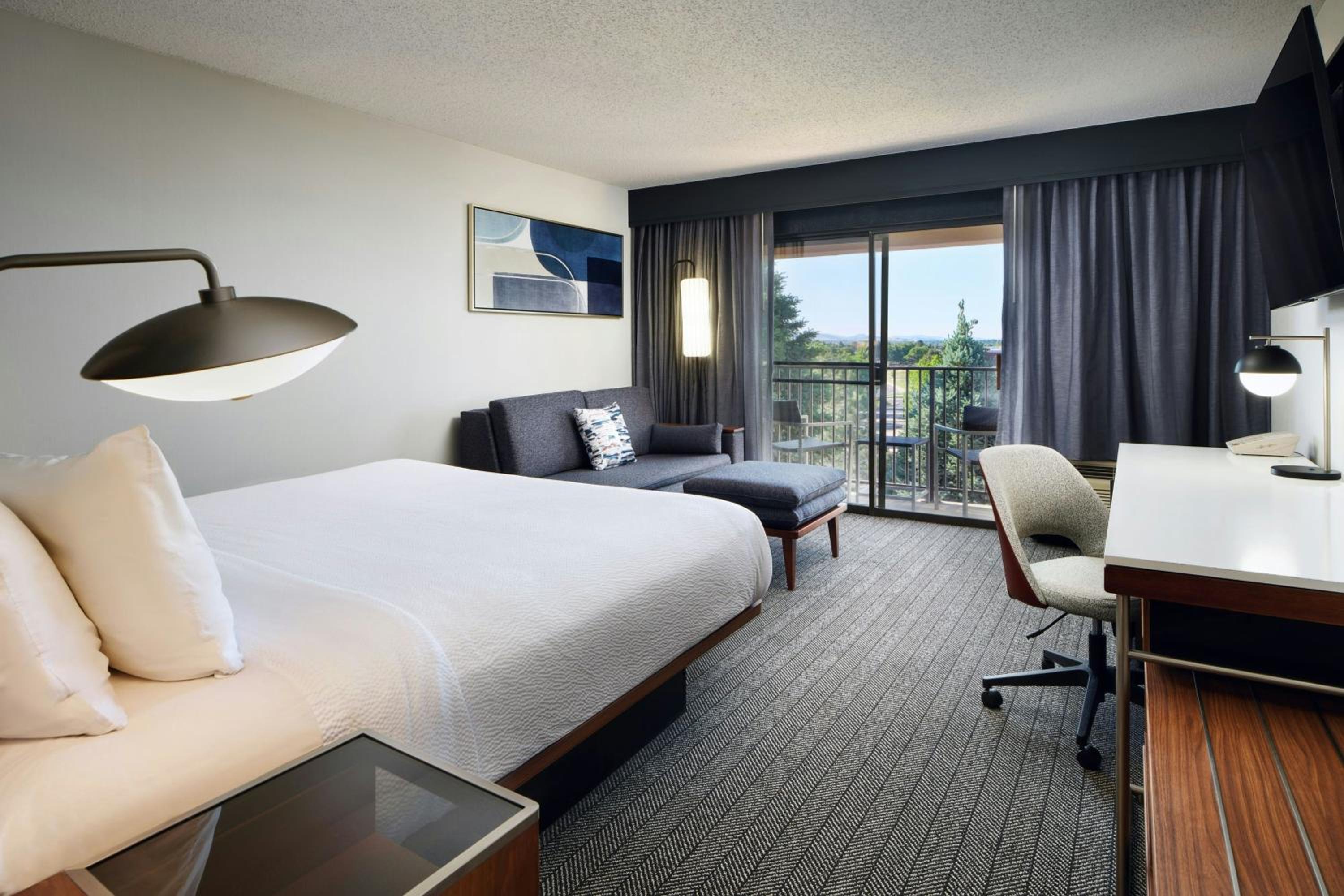King Room with Balcony and Sofa Bed - Hearing Accessible photo 1