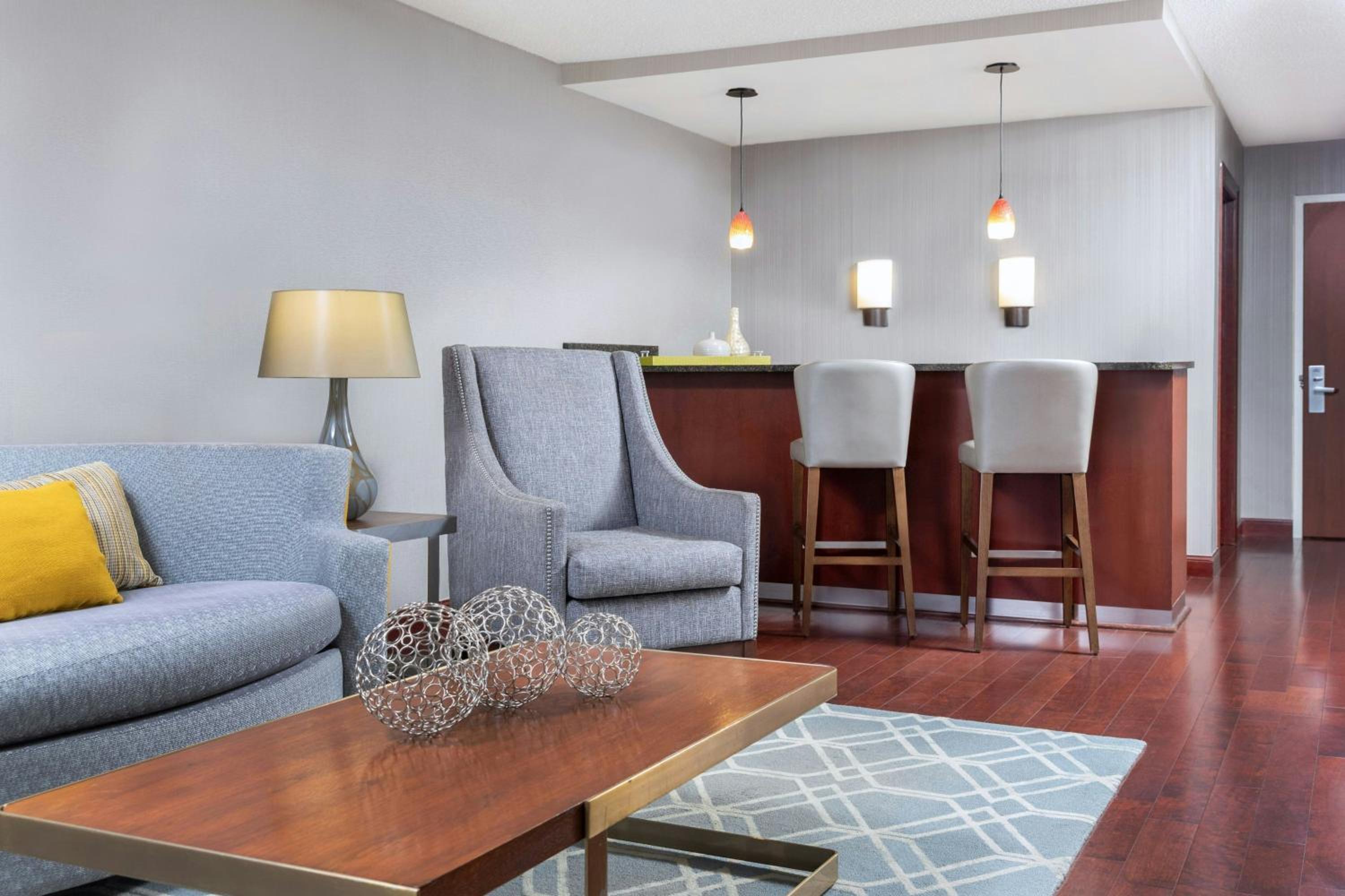 One-Bedroom King Suite with Dining Area and Specialty Bathtub