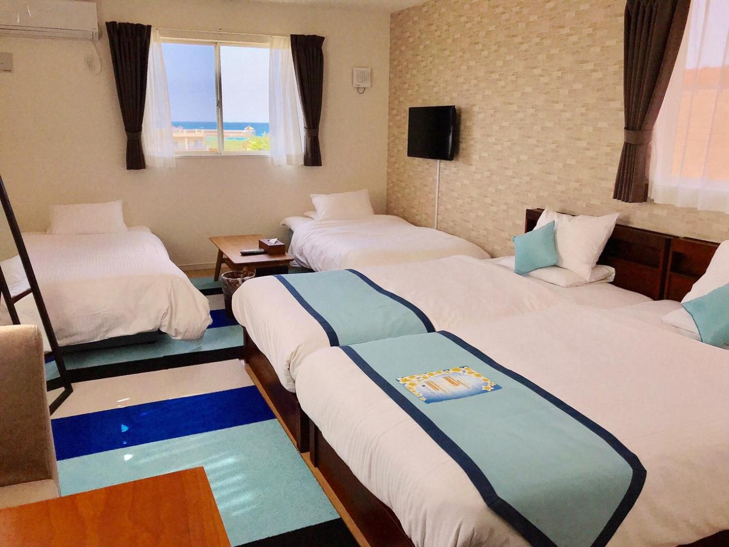 Deluxe Quadruple Room - Photo 10