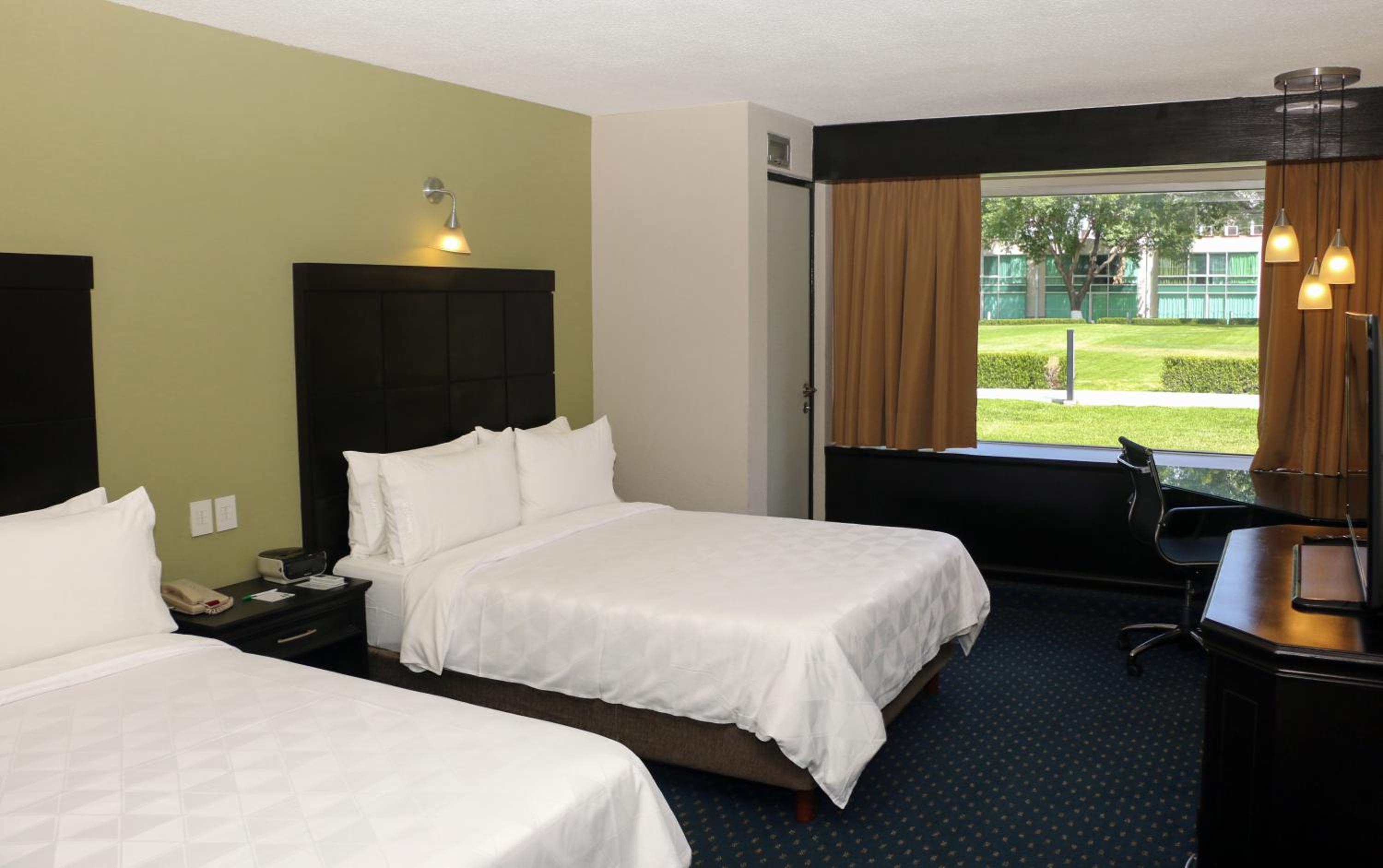 Standard Double Room with Two Double Beds and Courtyard Access - Photo 1