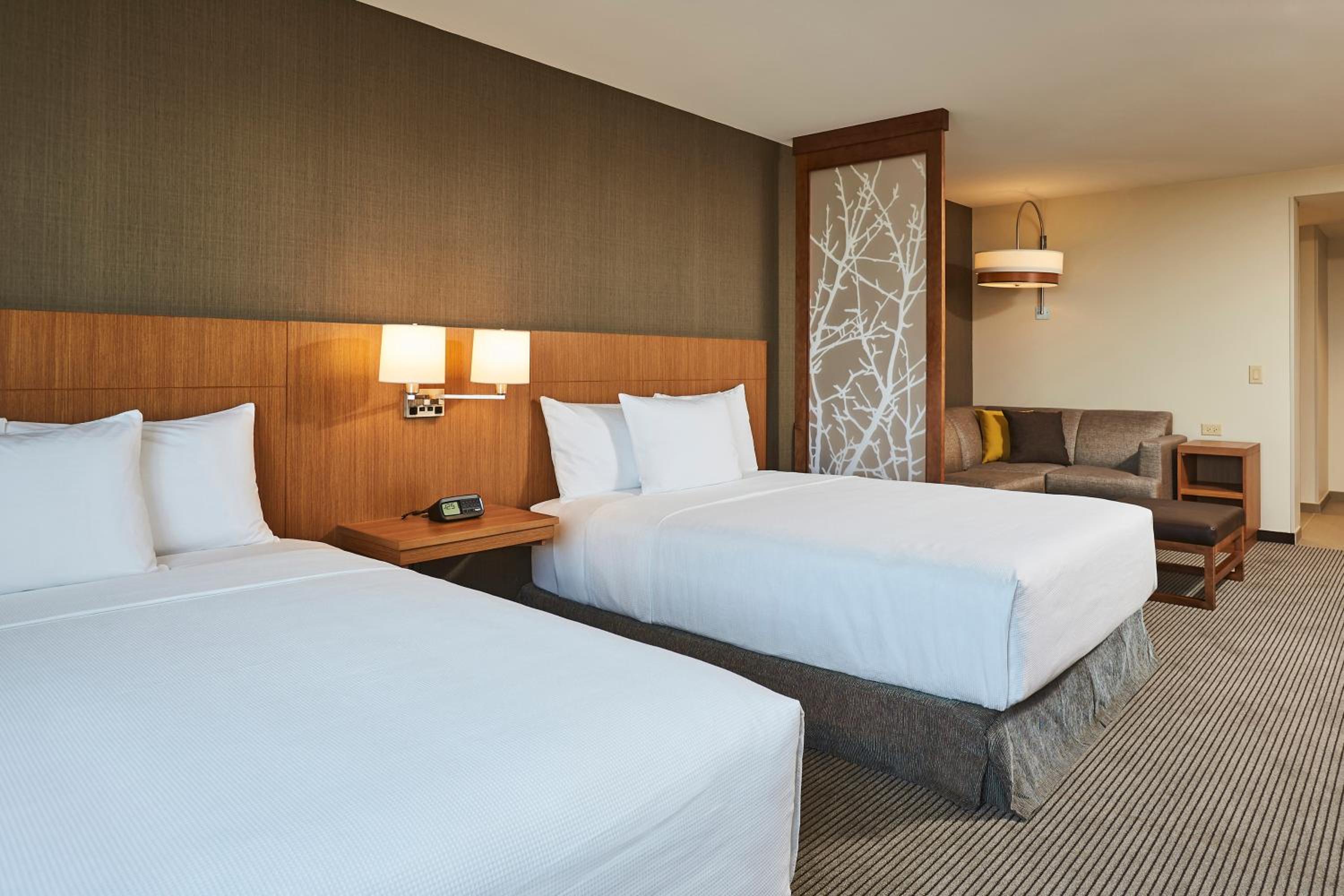 Queen Room with Two Queen Beds and Sofa Bed