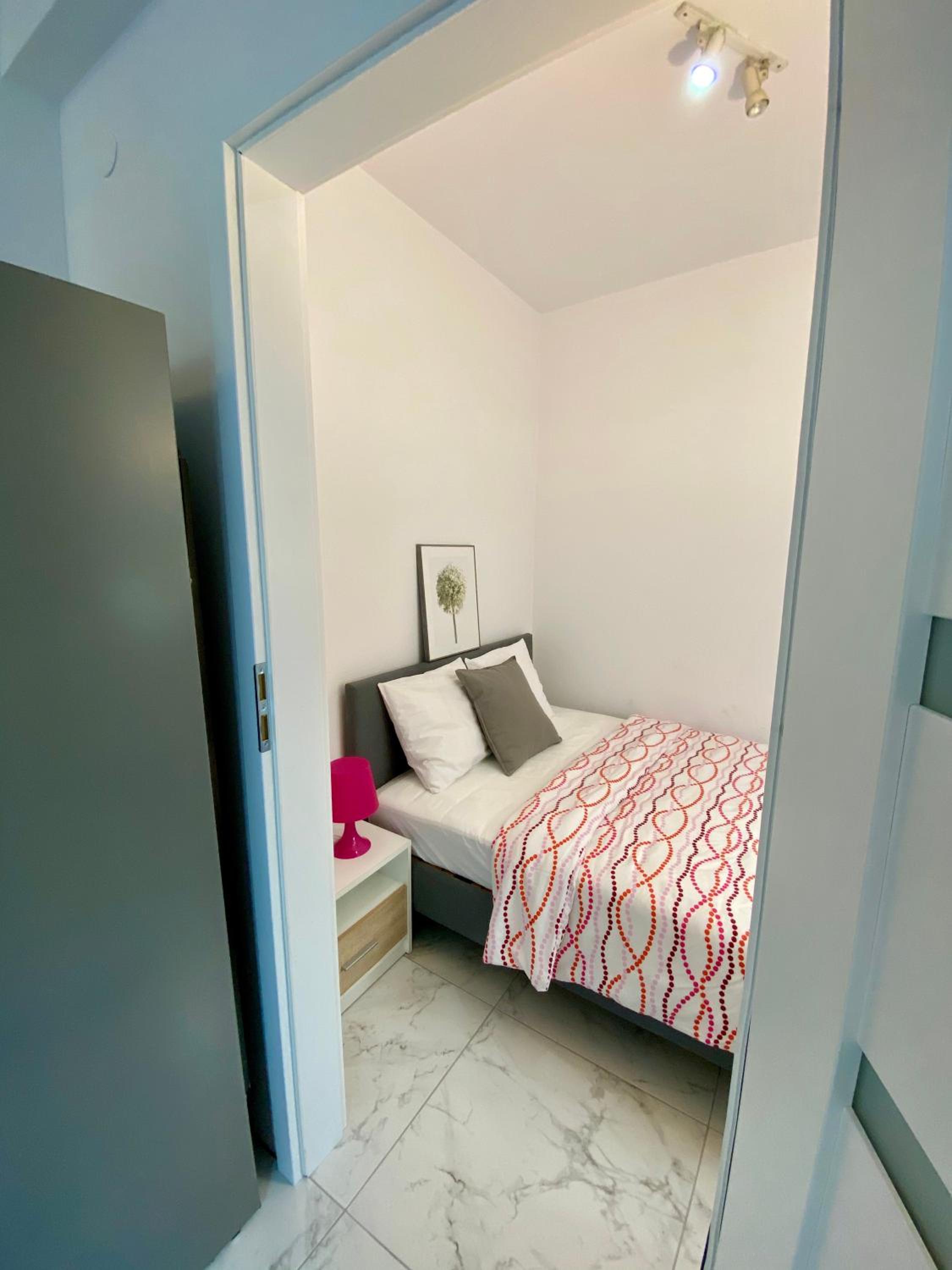 Two-Bedroom Apartment - Photo 40