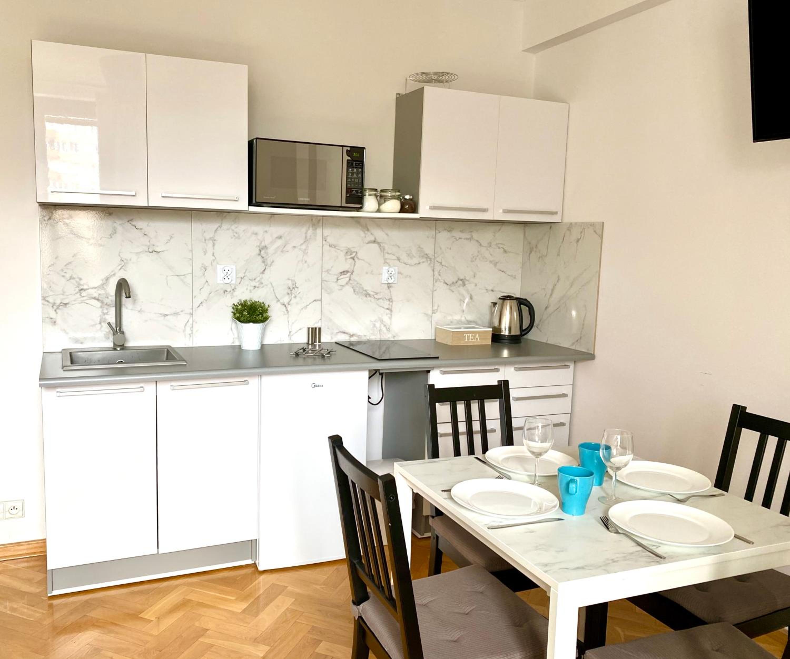 Three-Bedroom Apartment - Photo 2