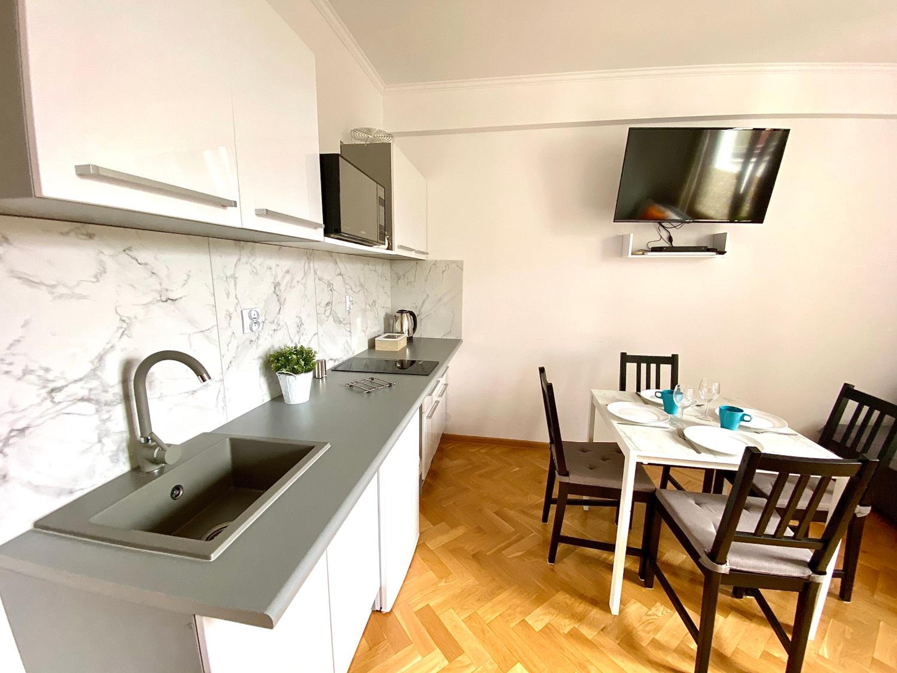 Three-Bedroom Apartment - Photo 3