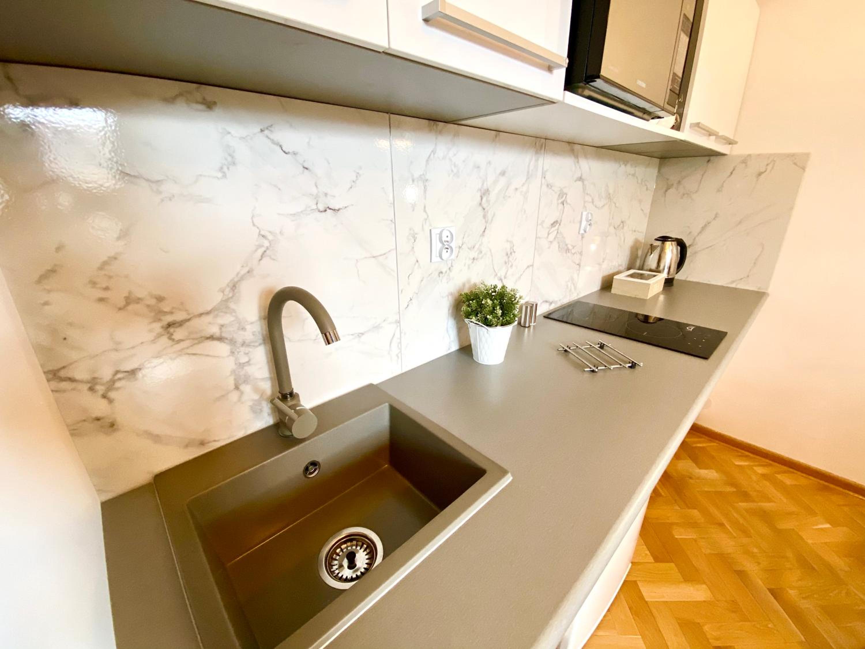 Three-Bedroom Apartment - Photo 37