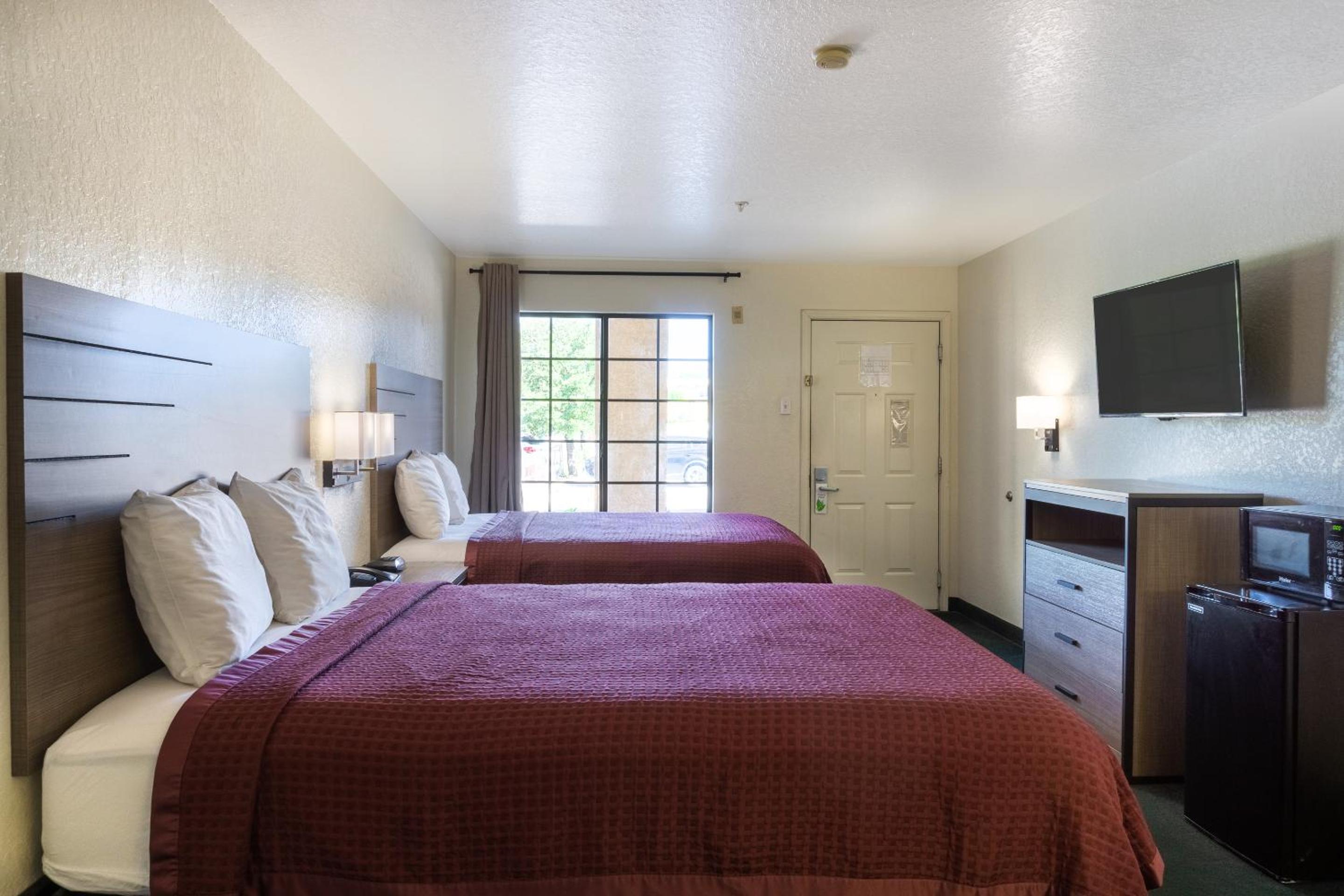 Queen Room with Two Queen Beds - Photo 1