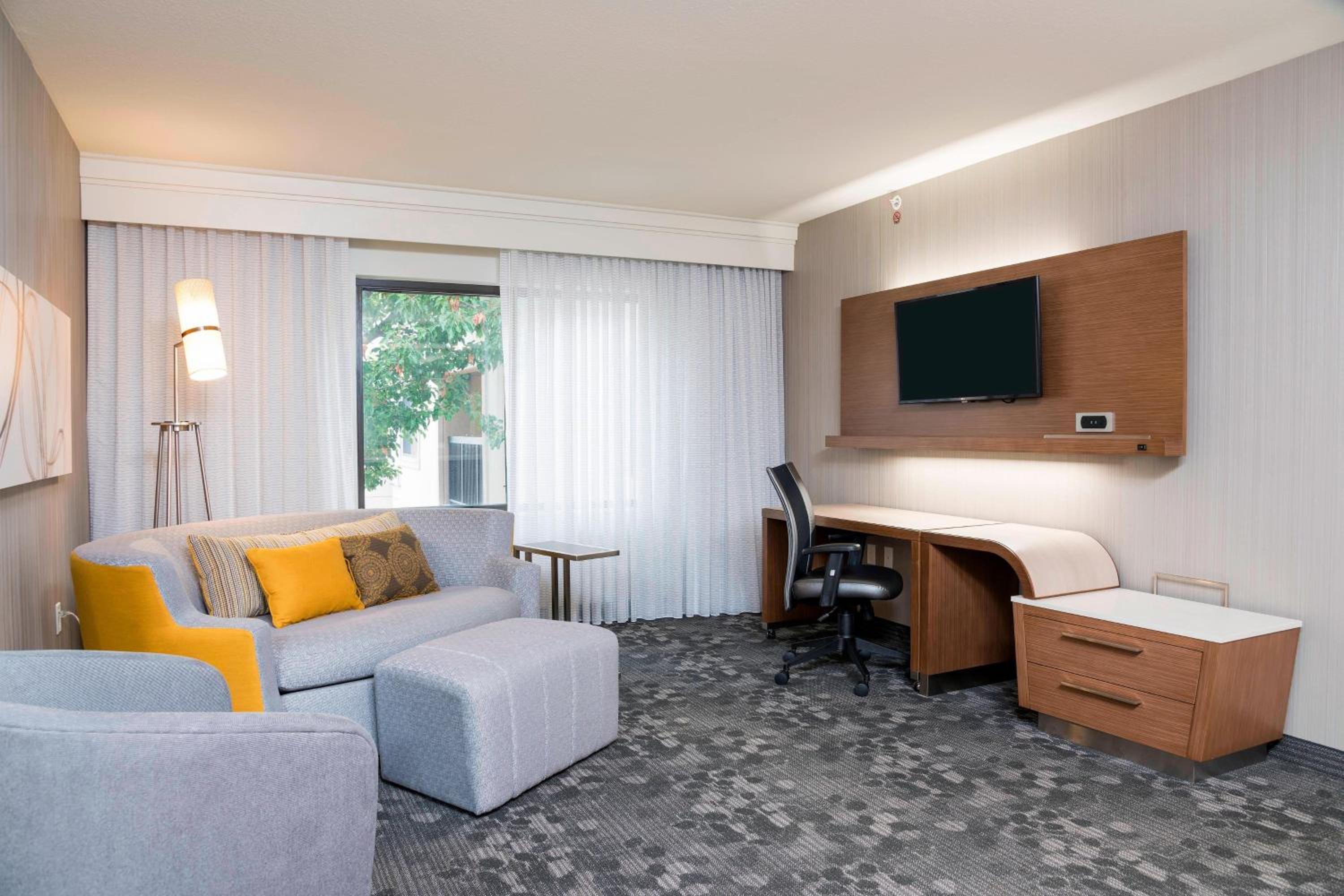 One-Bedroom King Suite with Roll-In Shower and Sofa Bed - Mobility Access/Hearing Accessible