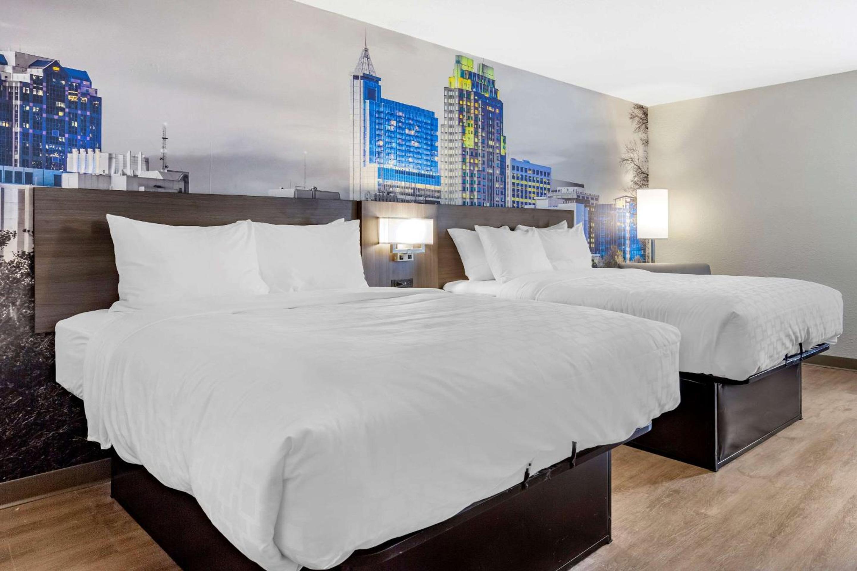 Standard Queen Room with Two Queen Beds - Non-Smoking photo 1