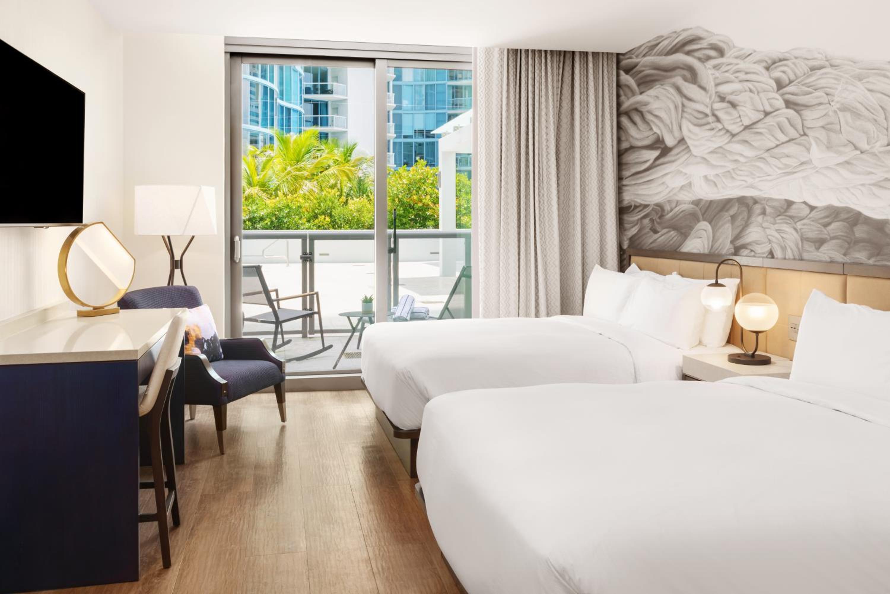 Queen Room with Two Queen Beds and Pool View - Photo 1