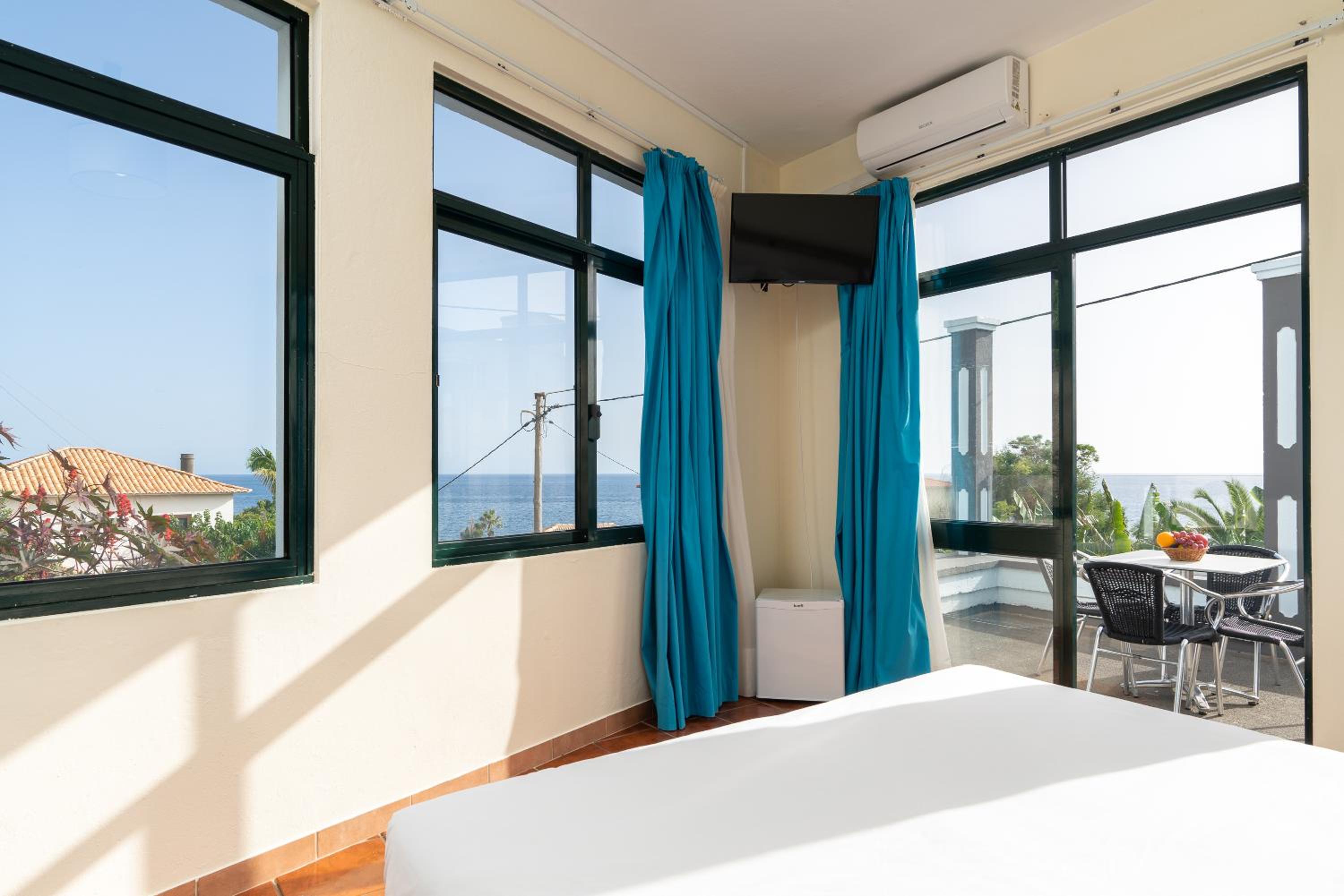 Double or Twin Room with Side Sea View photo 1