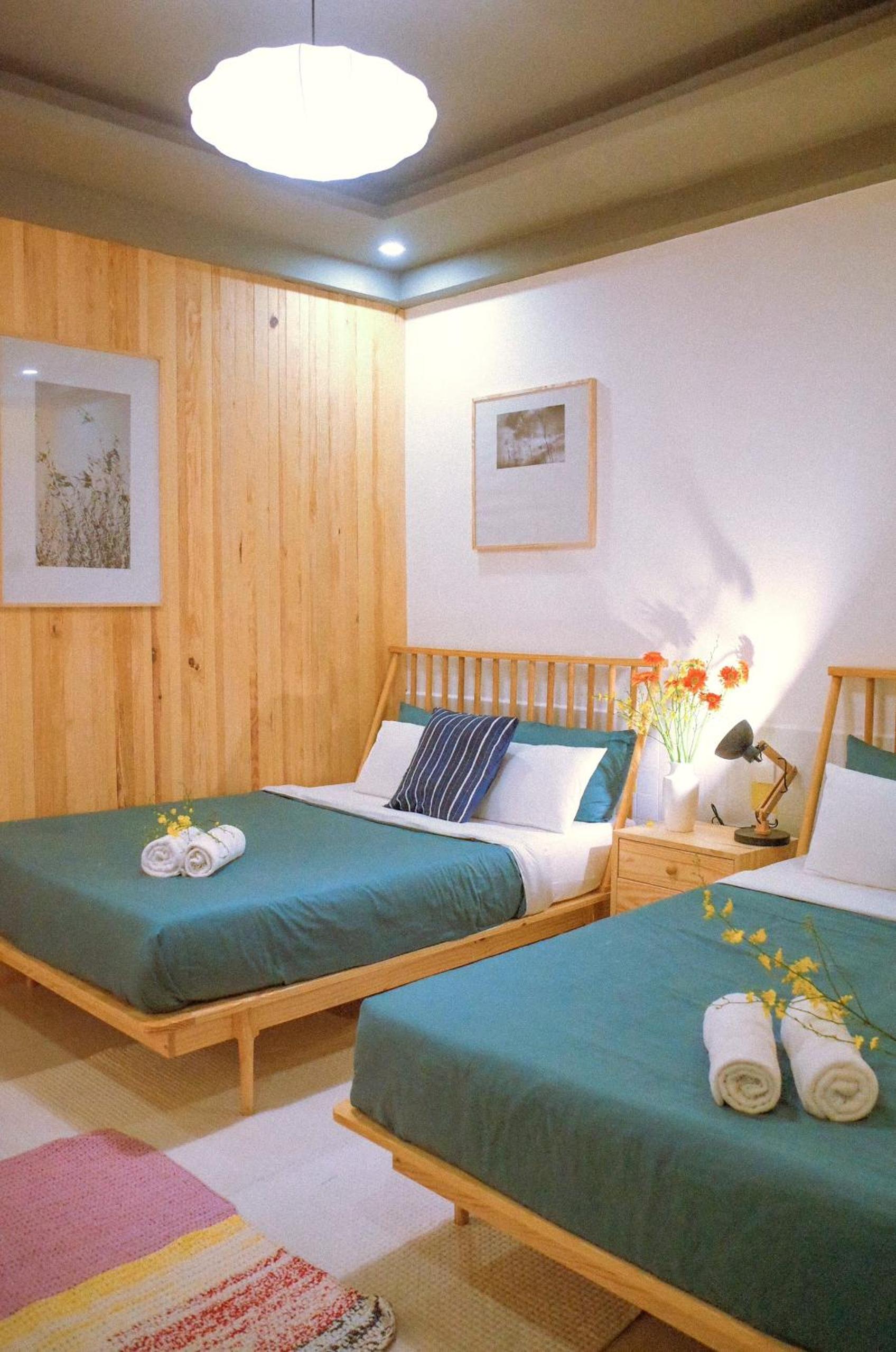 Deluxe Quadruple Room - Photo 13