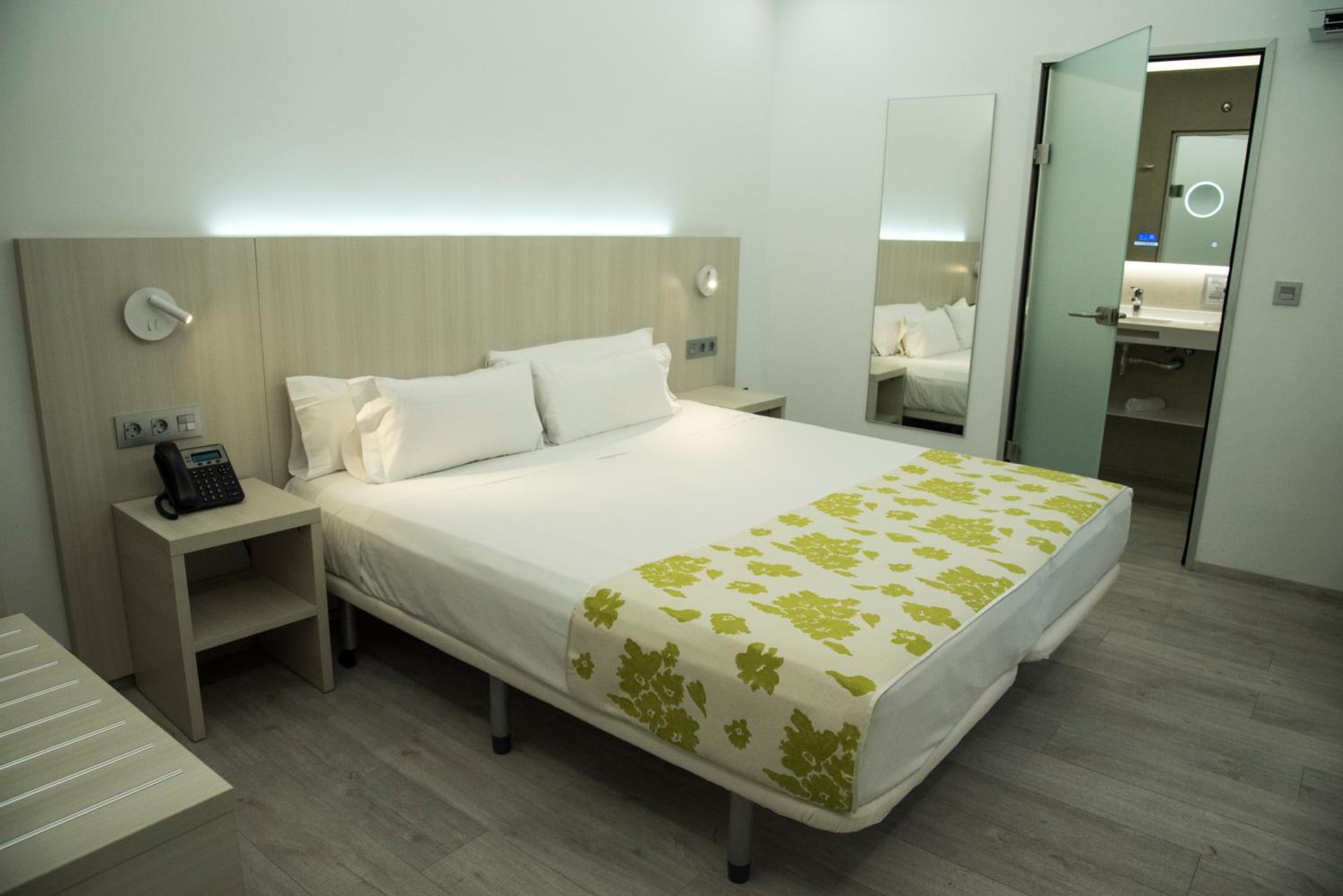 Habitación Doble Estándar o con Dos Camas Individuales.