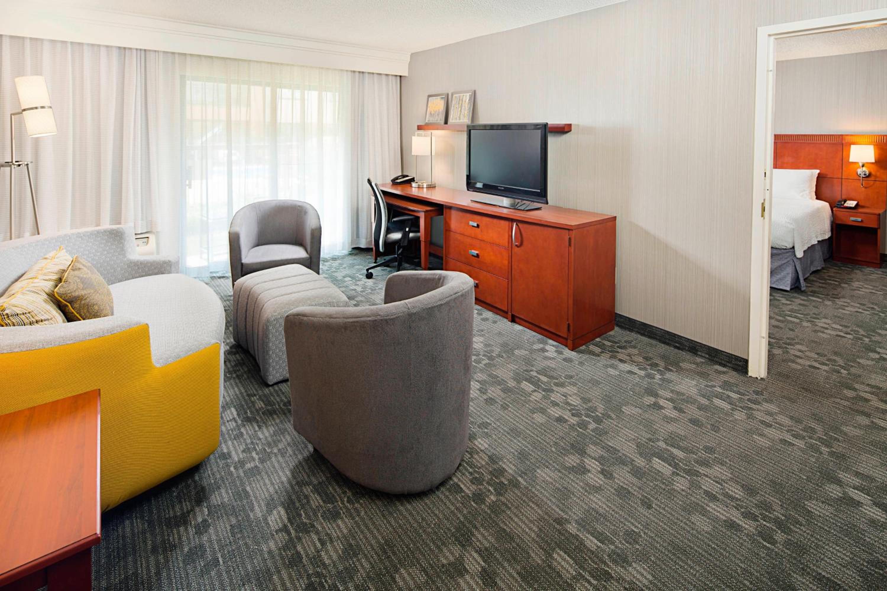 One-Bedroom King Suite with Roll-In Shower and Sofa Bed - Mobility Access/Hearing Accessible