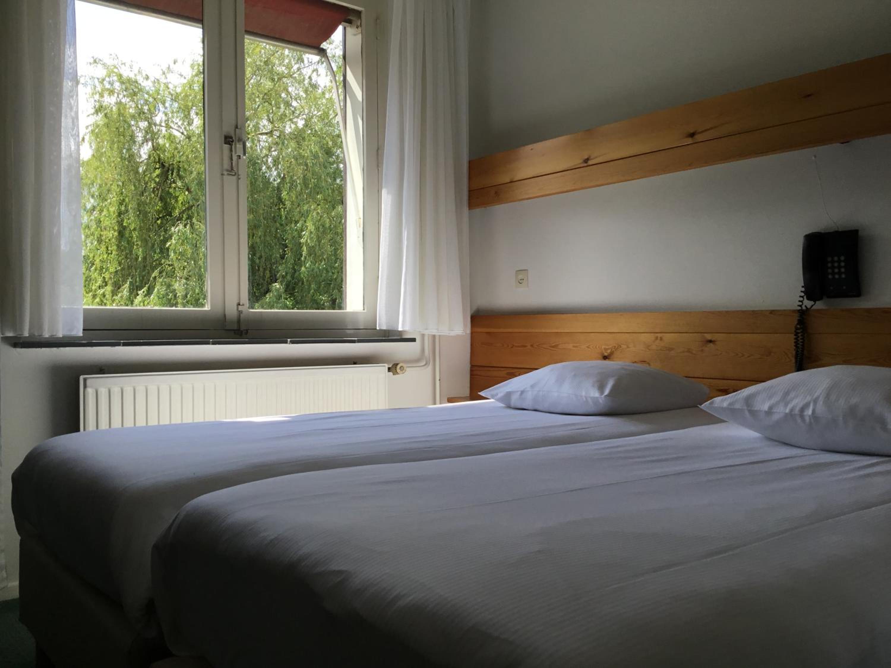 Standard Twin Room - Photo 5