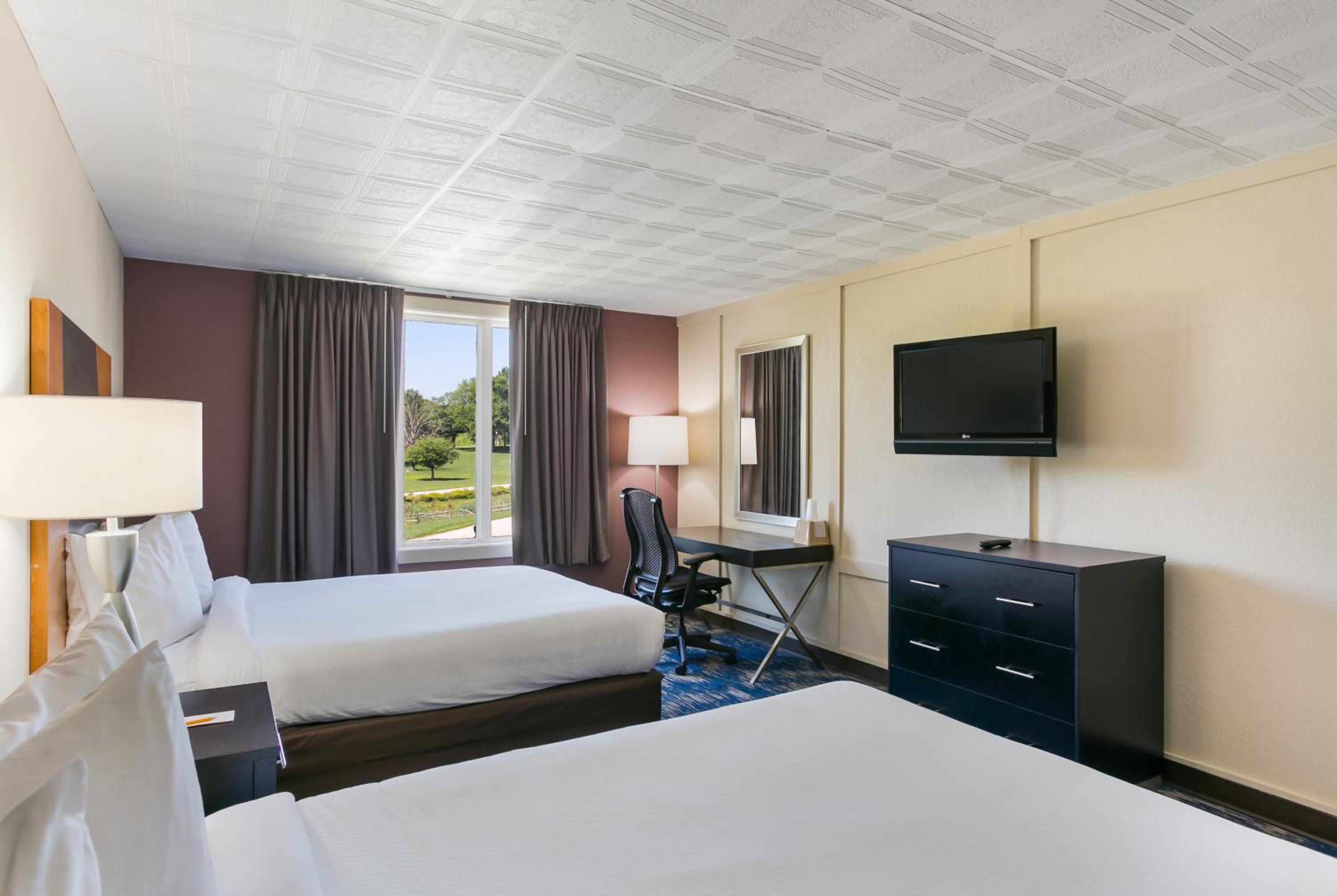 Deluxe Room with Two Queen Beds - Photo 1