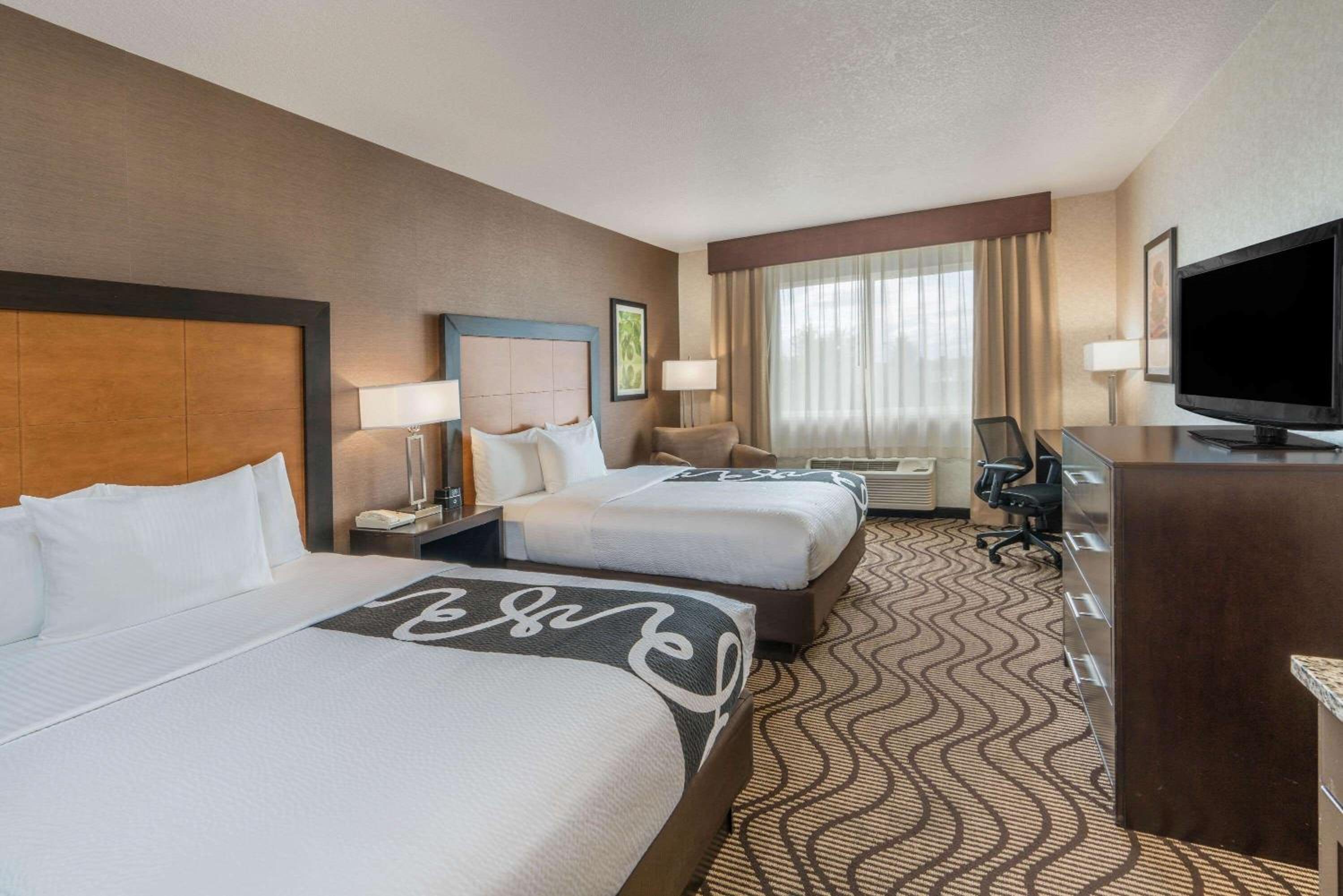 Deluxe Queen Room with Two Queen Beds - Photo 1