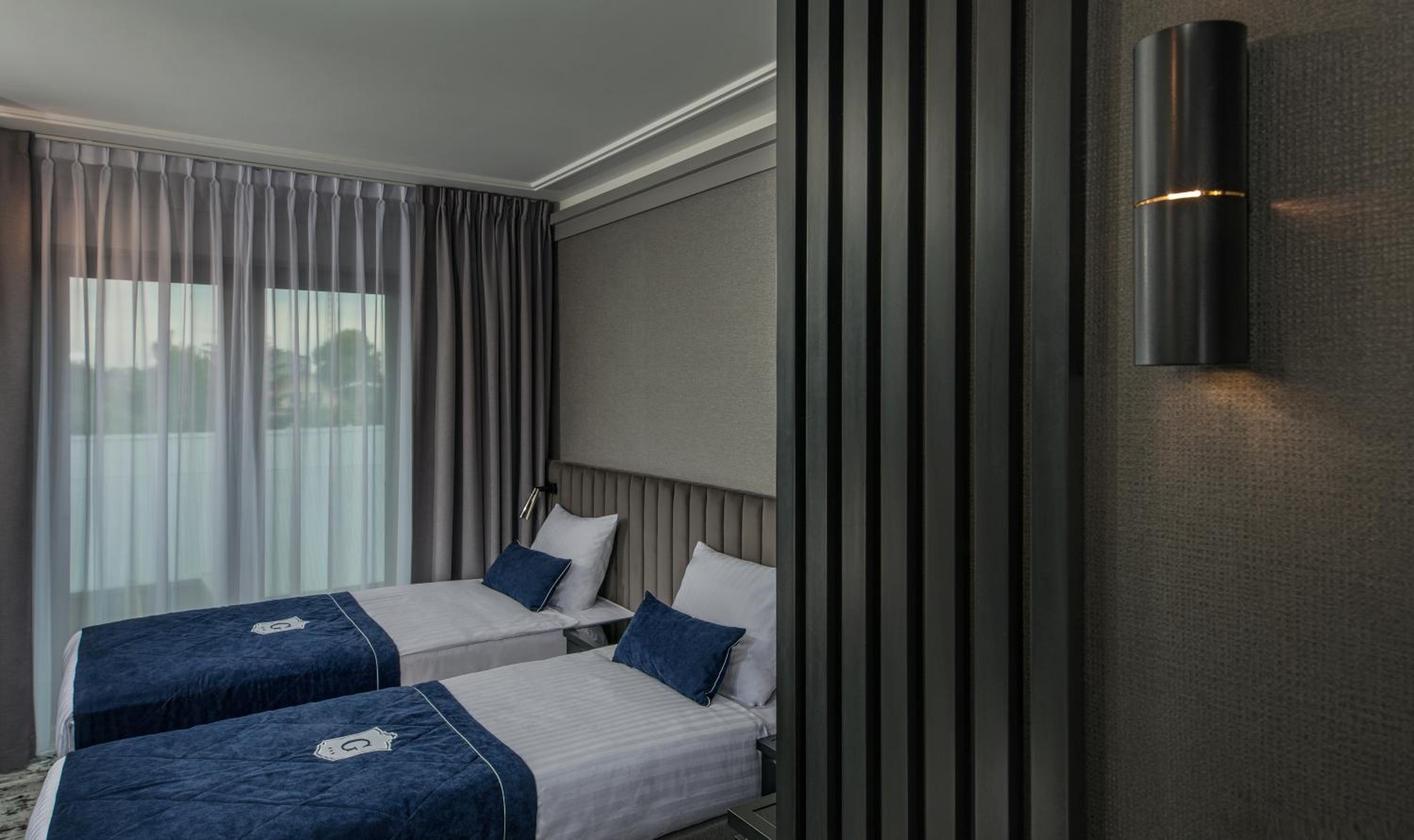 Deluxe Twin Room - Photo 2