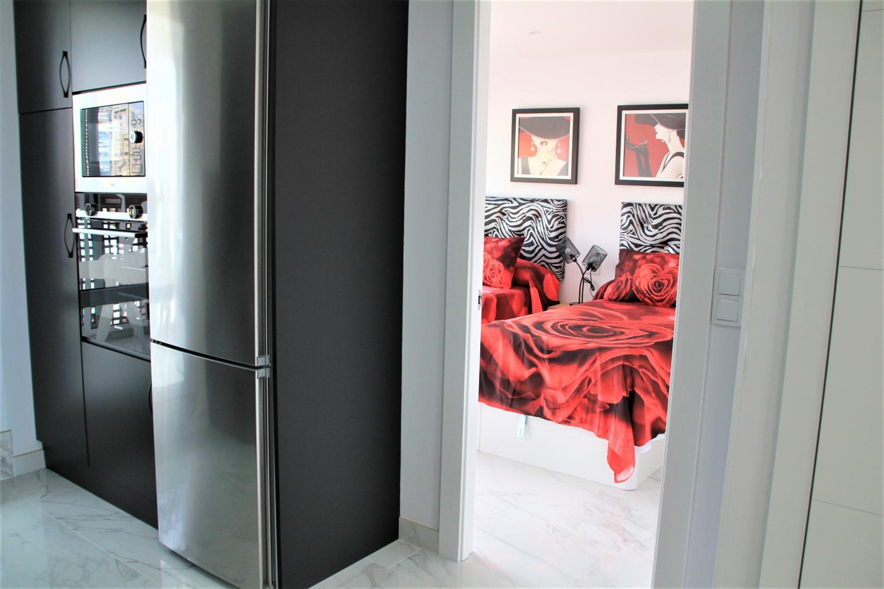 Three-Bedroom Apartment - Photo 8