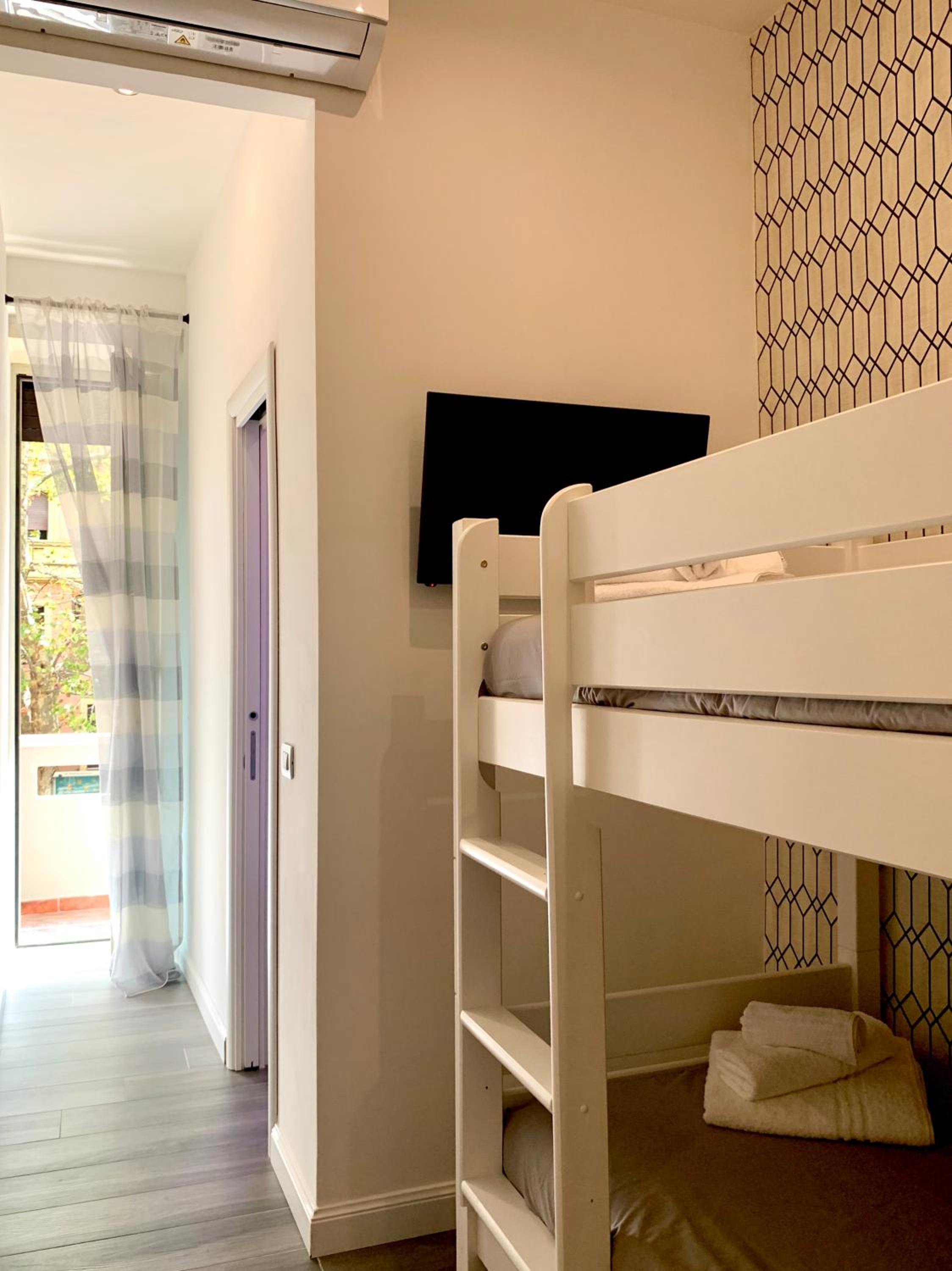 Twin Room with Bunk Bed and Balcony photo 3