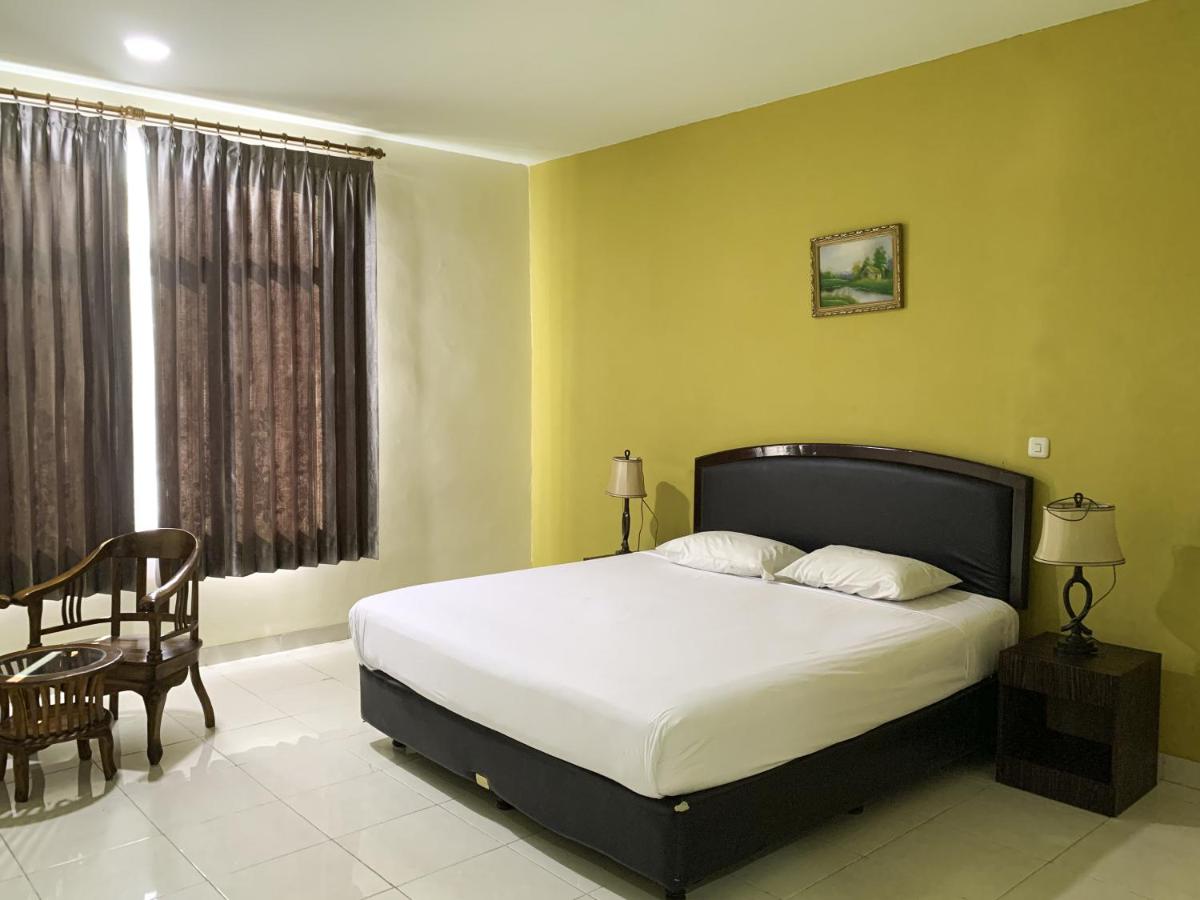 Deluxe Room - Photo 1