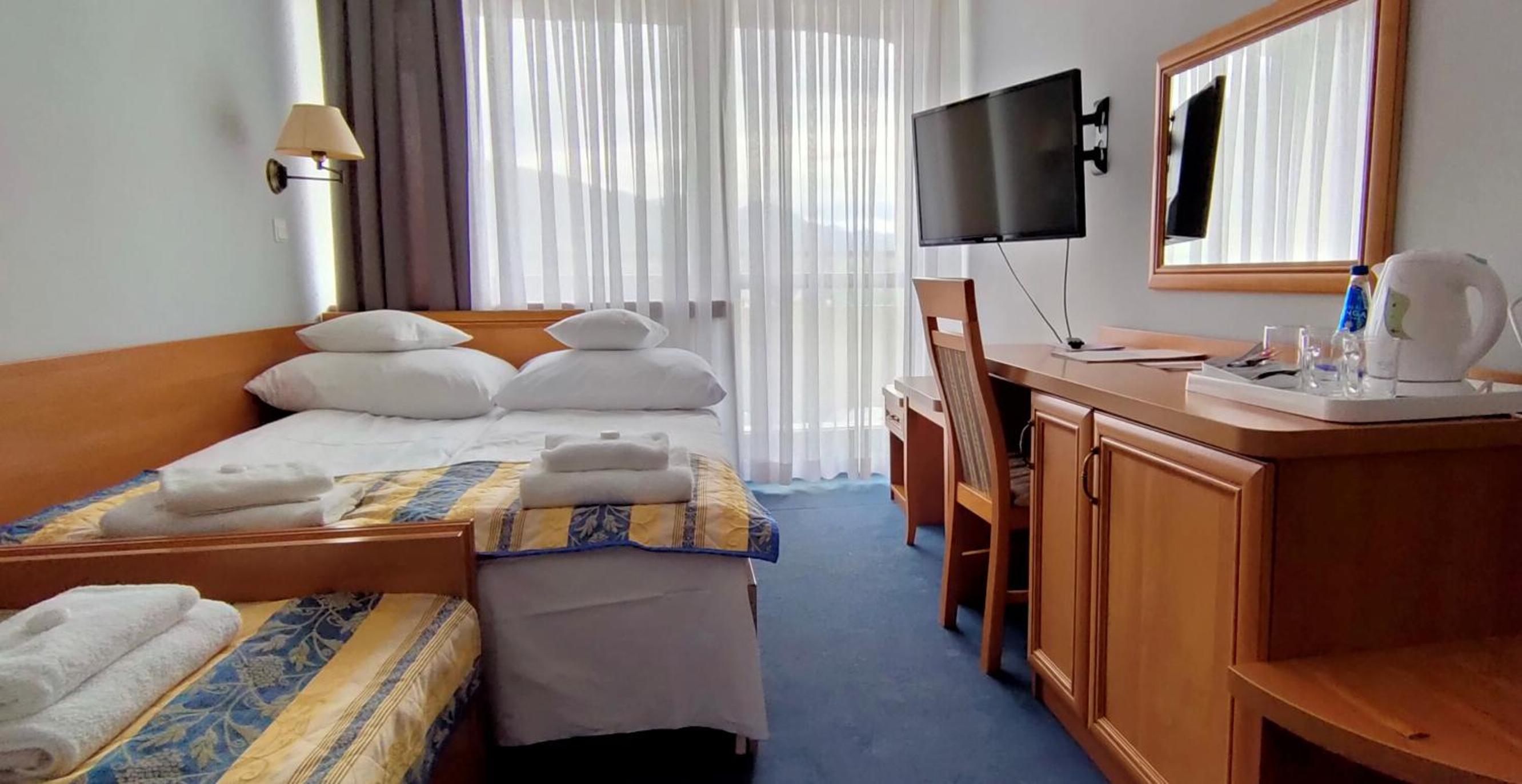 Double Room with an extra bed view / balcony - Photo 13