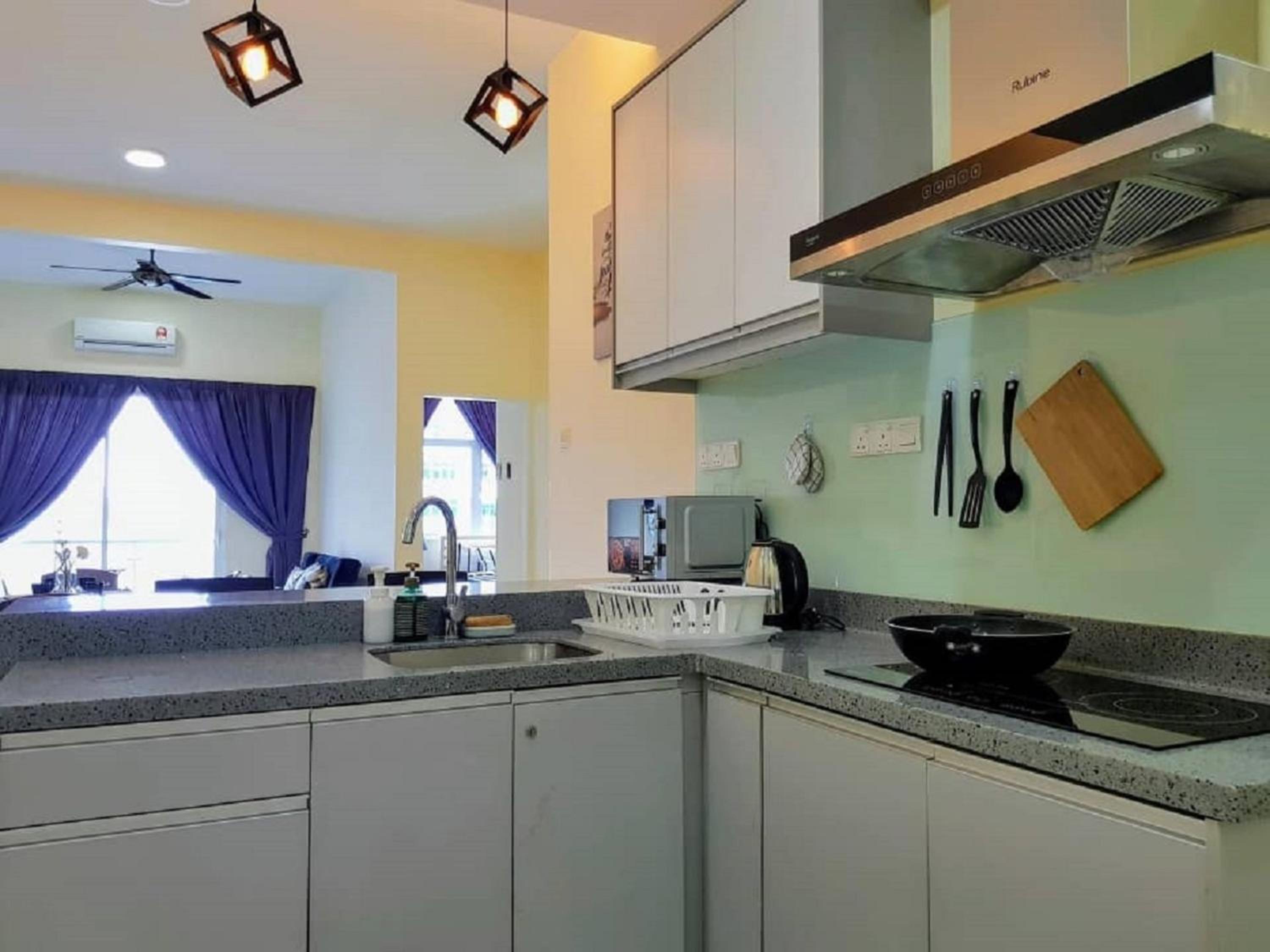 Three-Bedroom Apartment - Photo 12