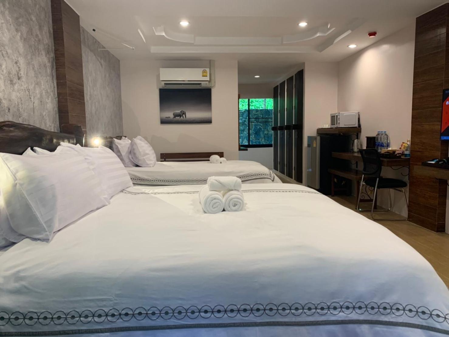 Deluxe Triple Room - Photo 9