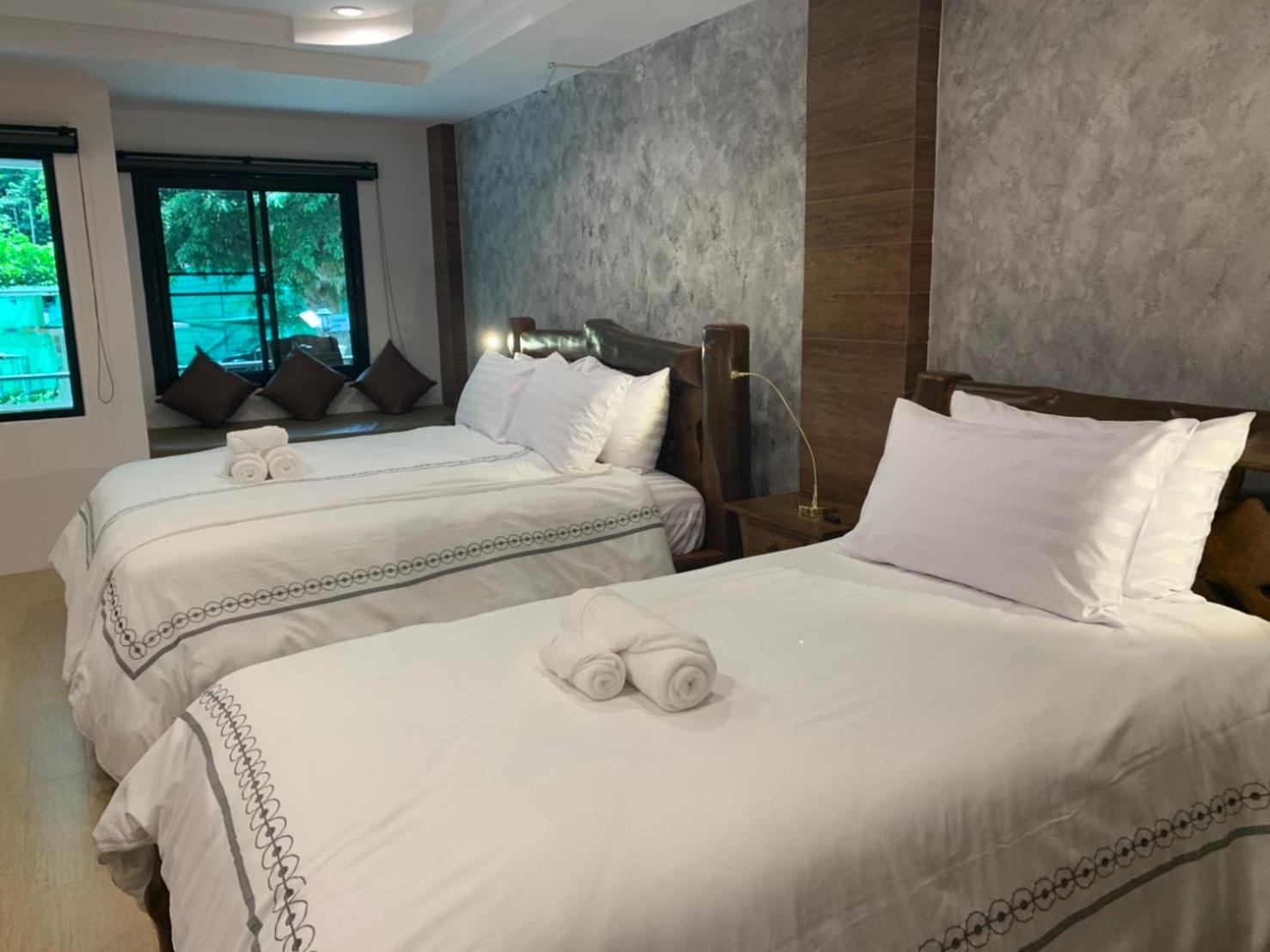 Deluxe Triple Room - Photo 8