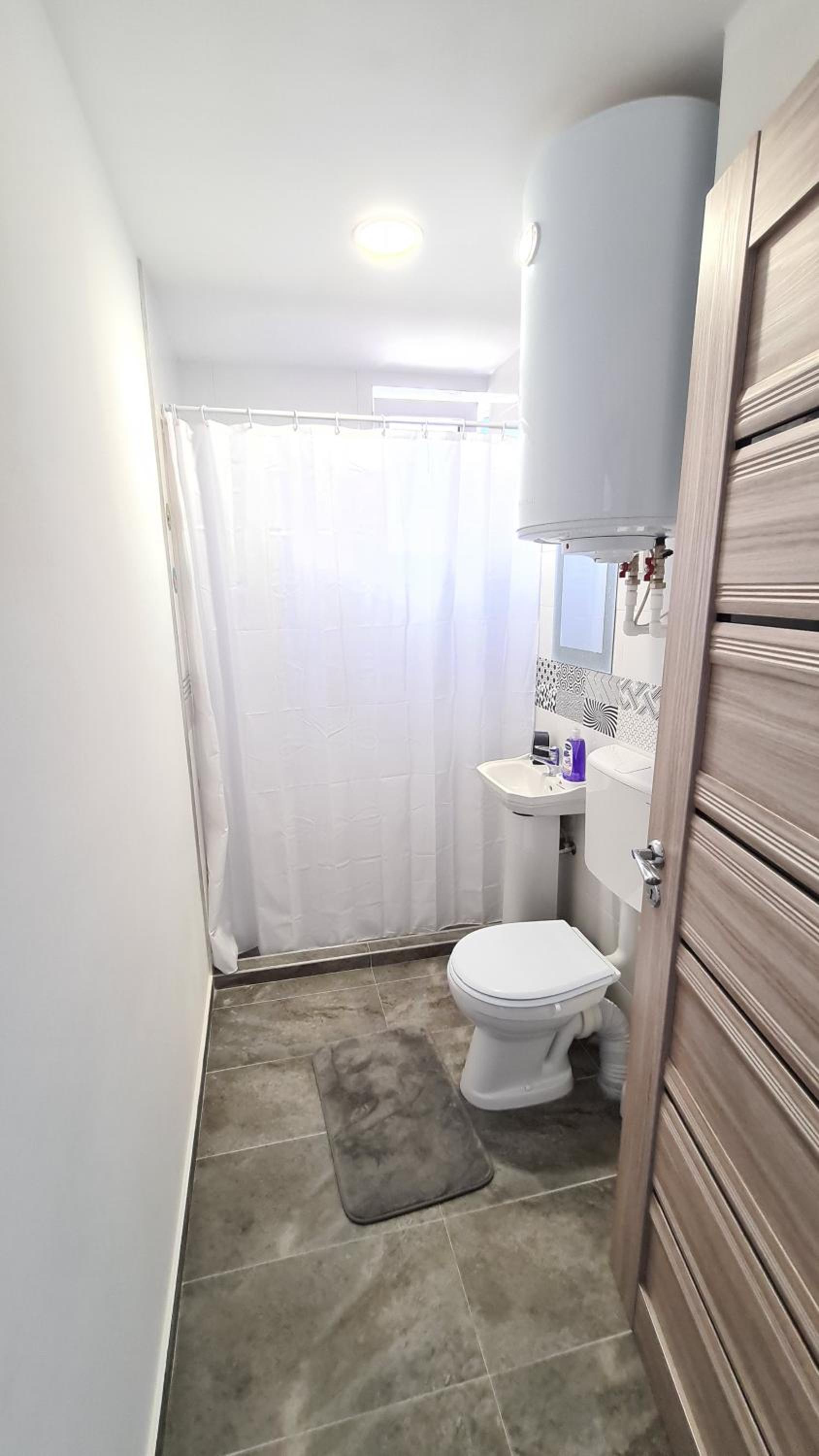 Two-Bedroom Apartment - Photo 16
