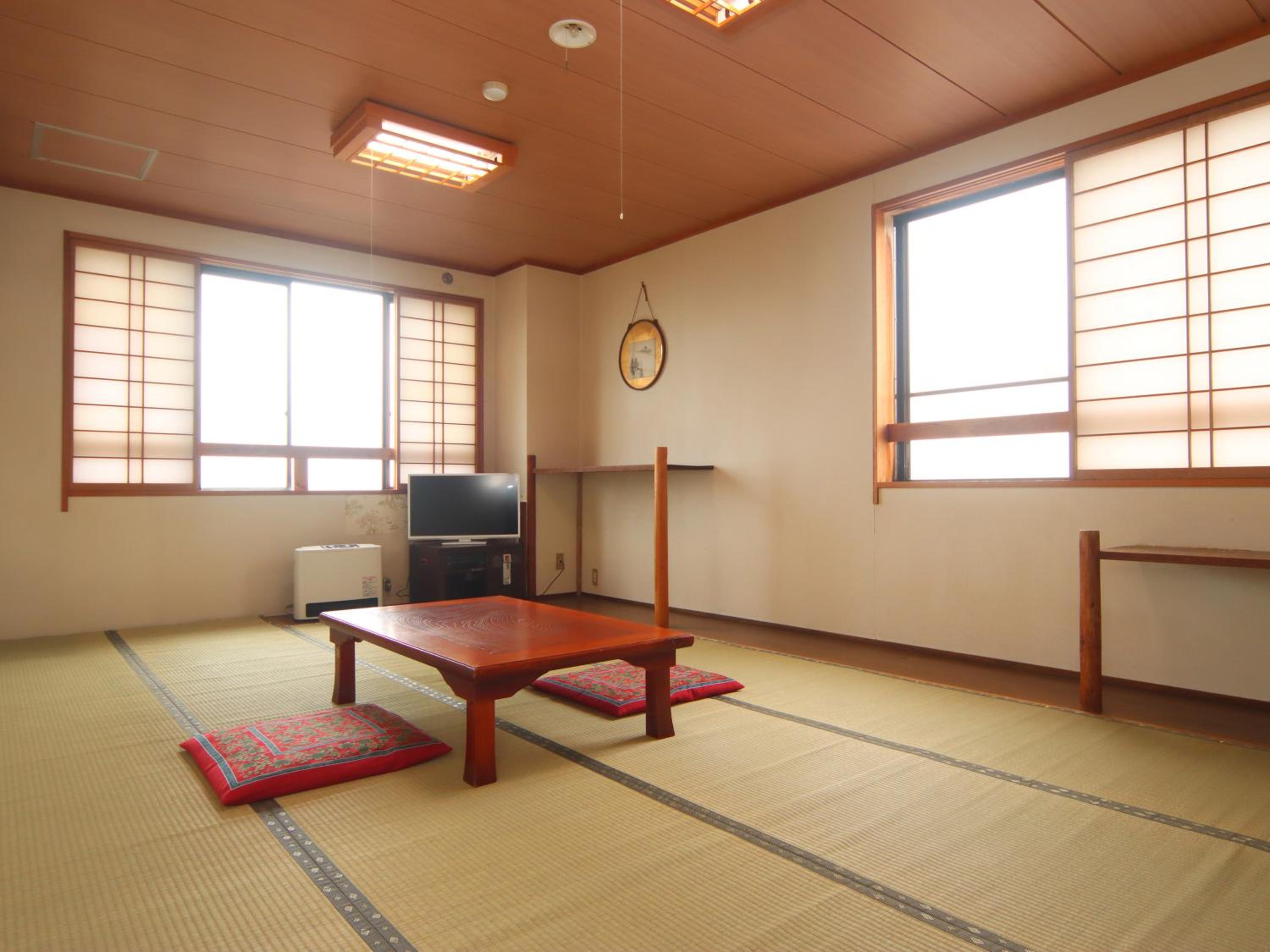 Quadruple Room with Private Bathroom