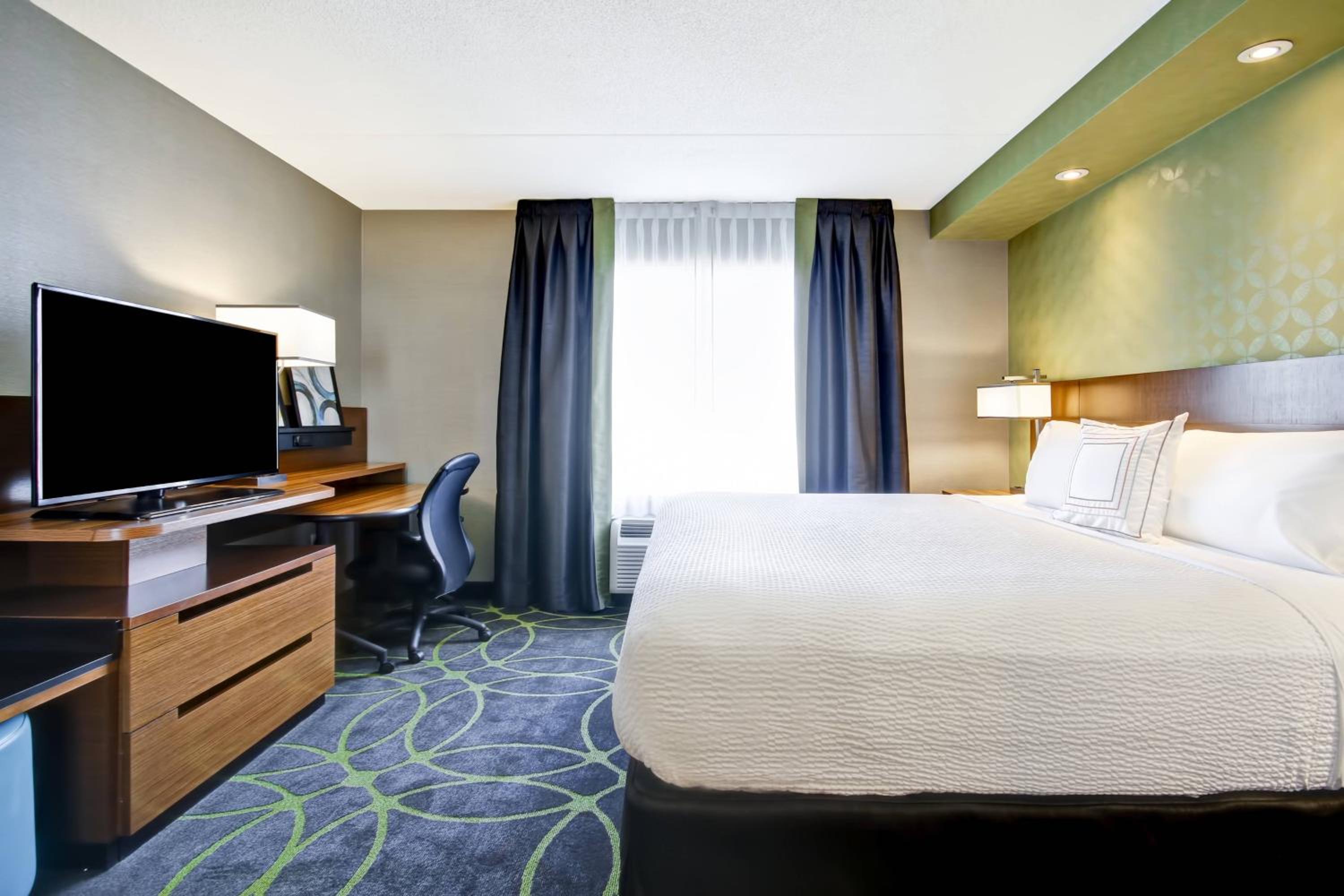 One-Bedroom King Suite with Roll-In Shower and Sofa Bed - Mobility Access/Hearing Accessible