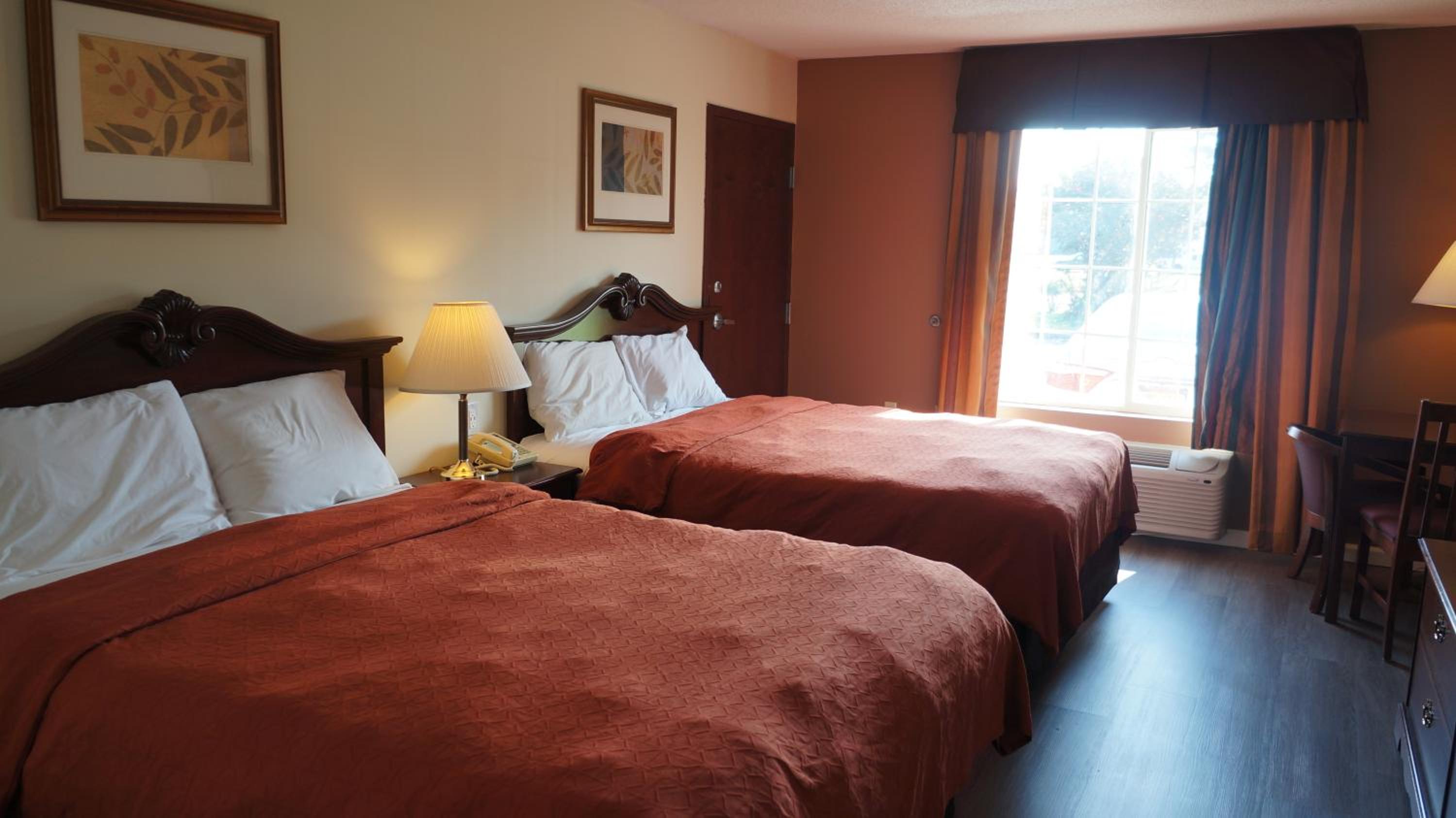 Deluxe Queen Room with Two Queen Beds - Photo 8