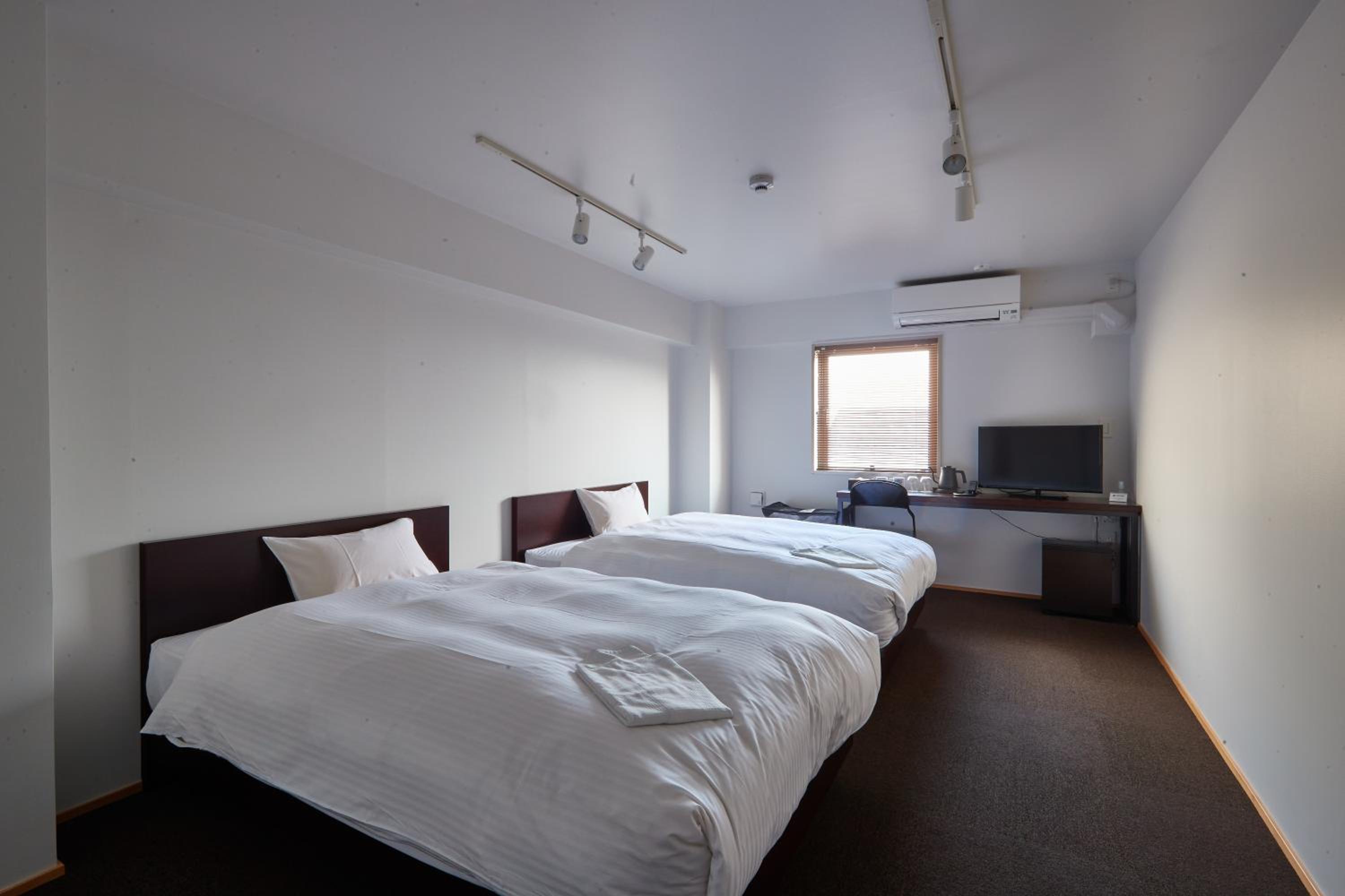Twin Room - Photo 1