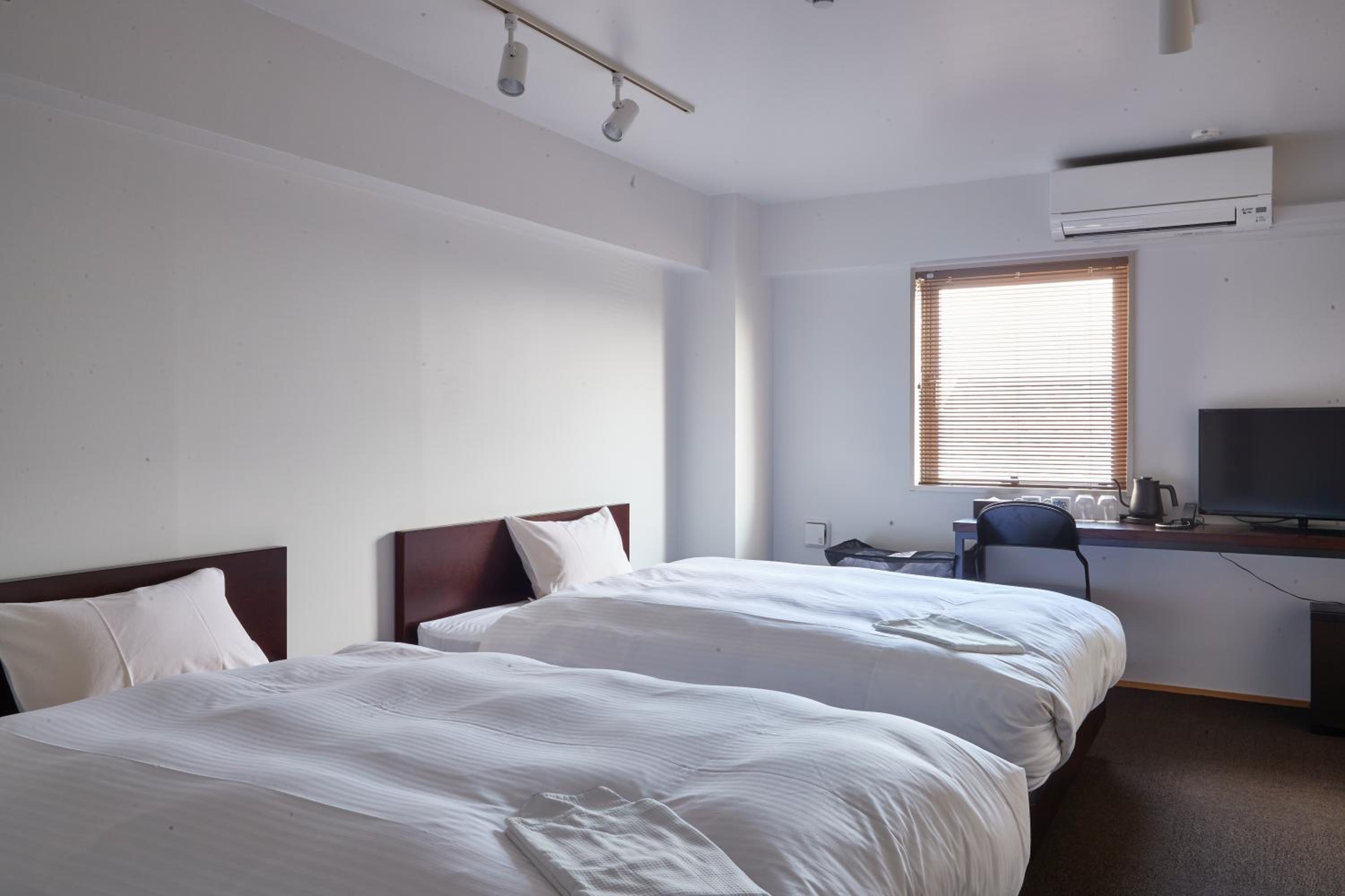 Twin Room - Photo 25