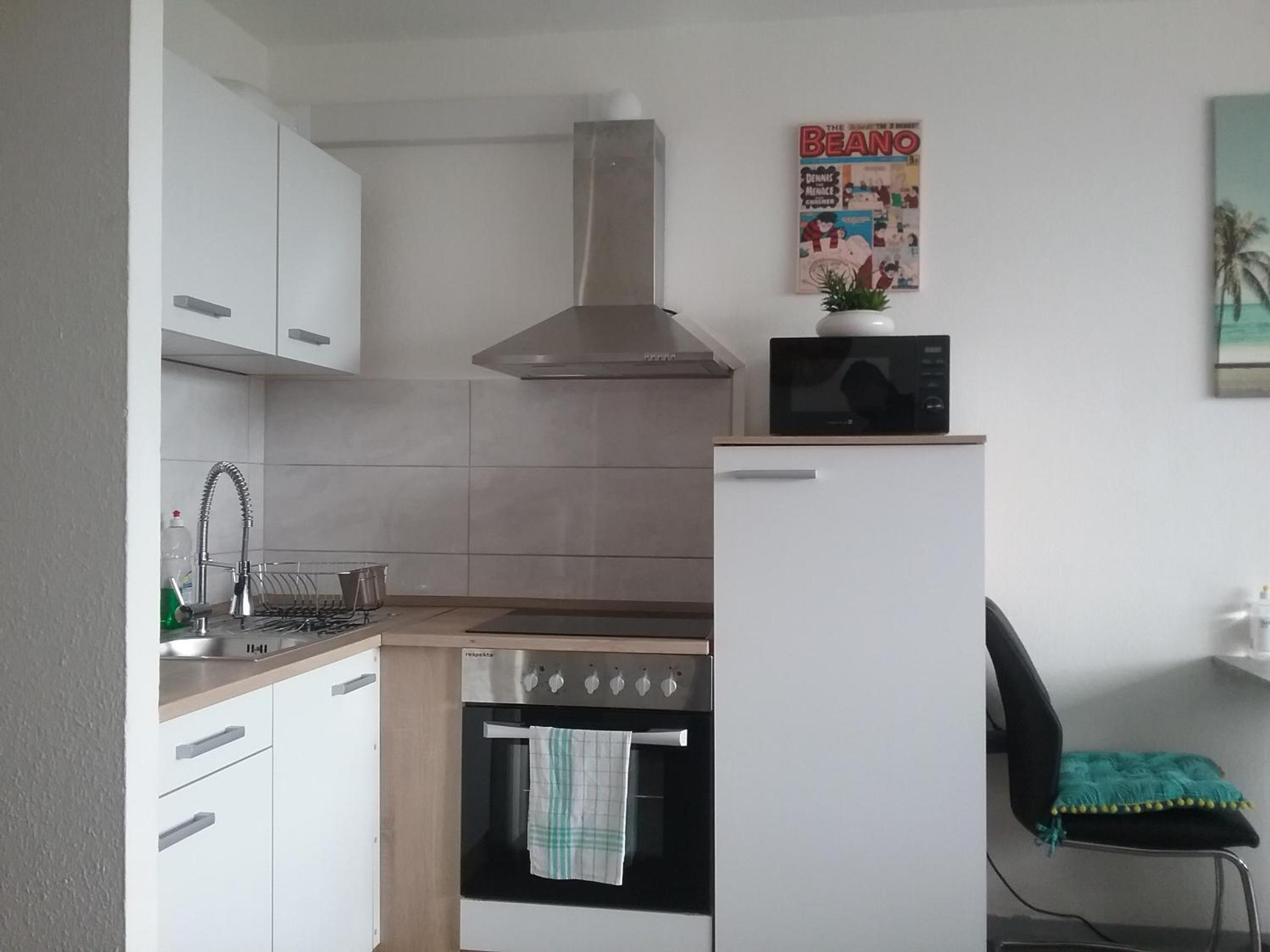 Apartment with Balcony - Photo 15