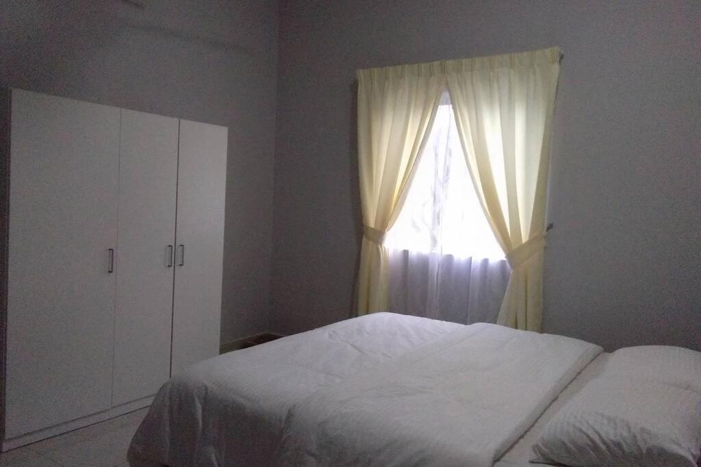 Three-Bedroom Apartment photo 2