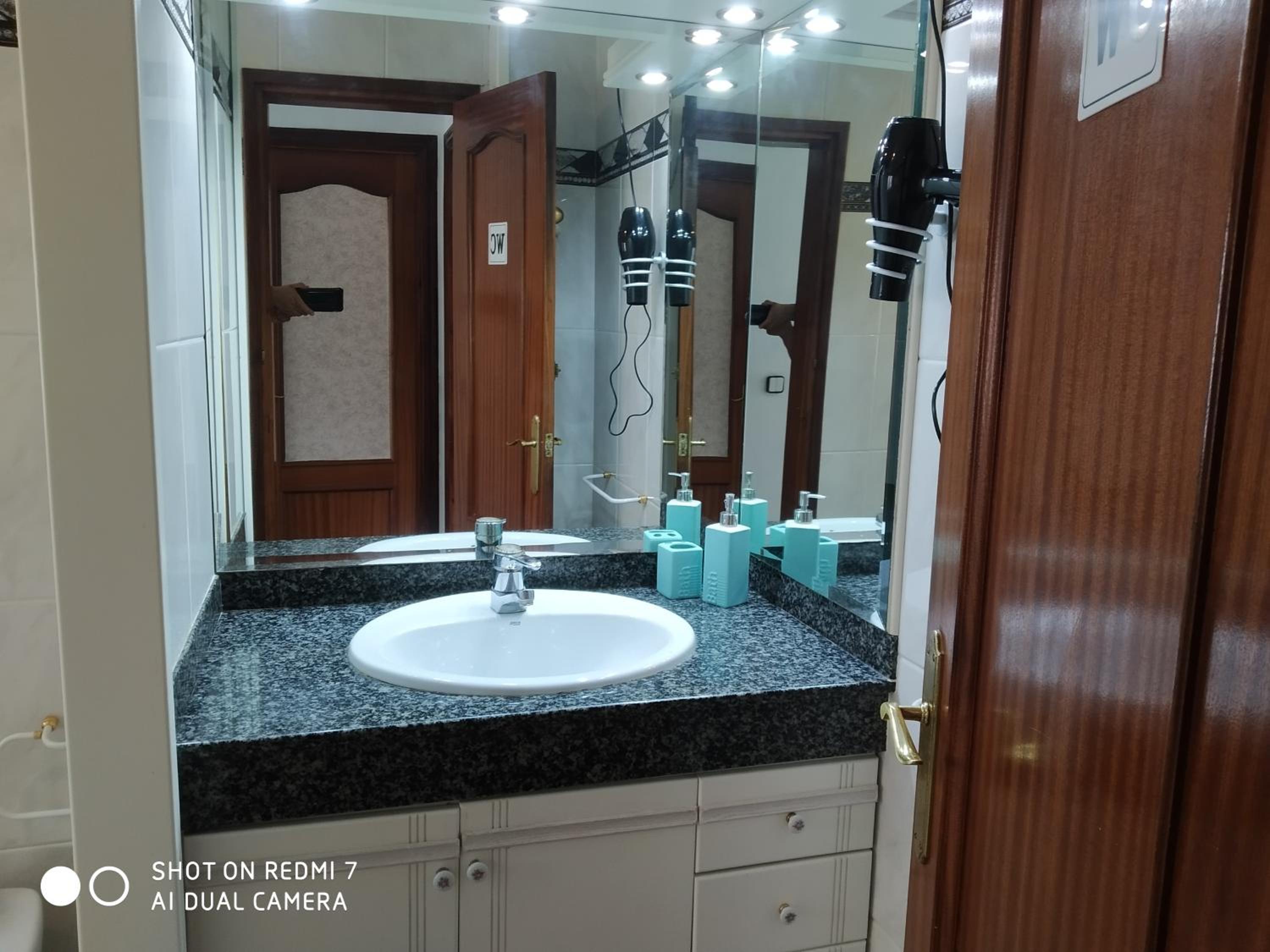 Three-Bedroom House - Photo 11