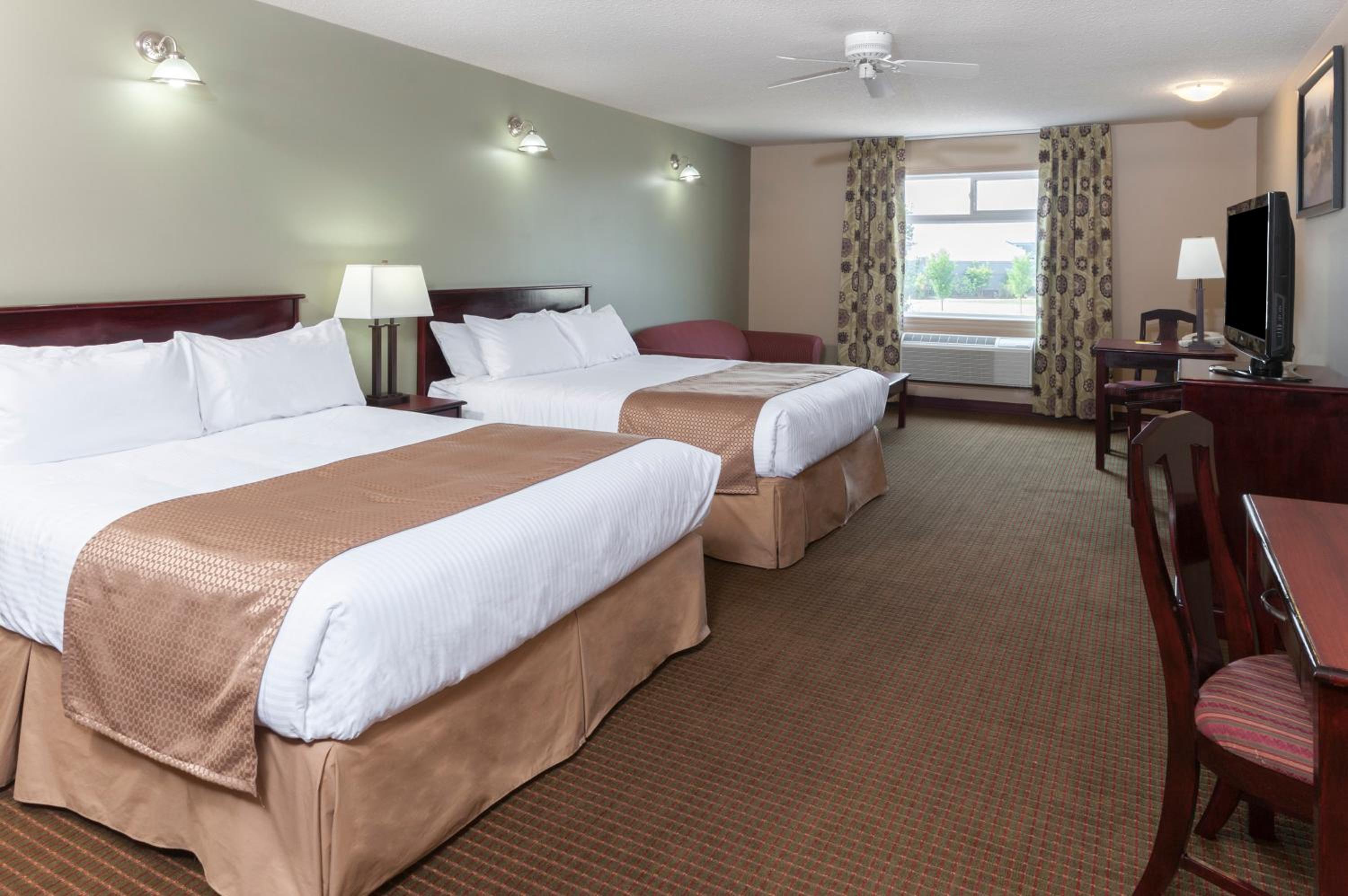 Queen Room with Two Queen Beds - Non-Smoking - Photo 1