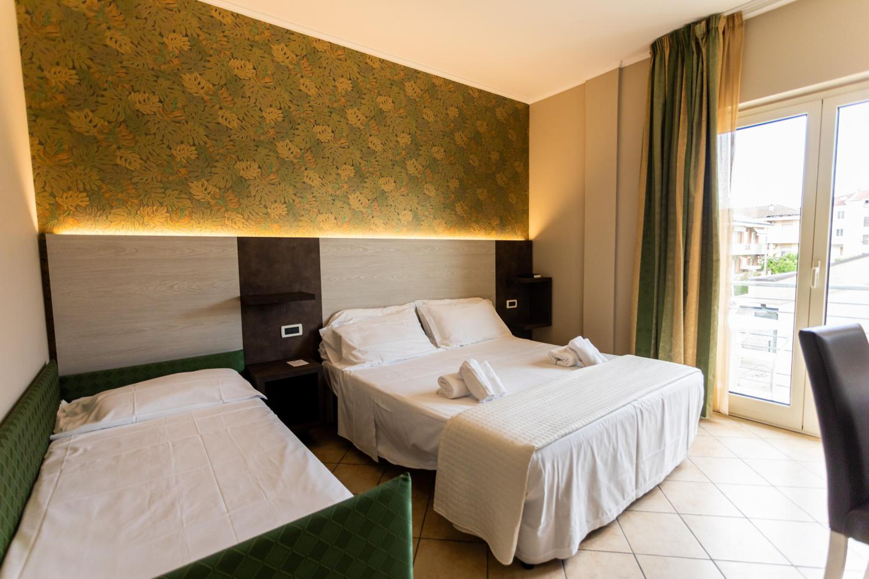 Quadruple Room with Balcony photo 1