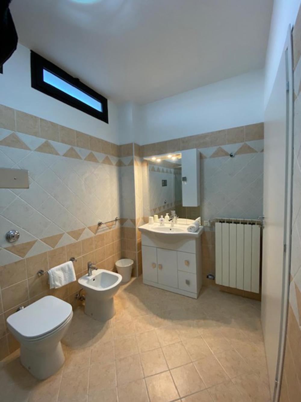 Deluxe Quadruple Room - Photo 7