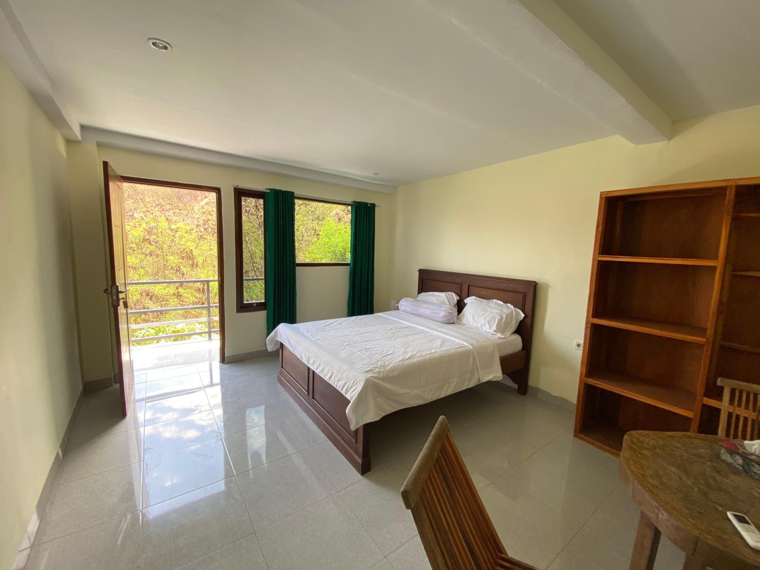 Deluxe Room - Photo 15