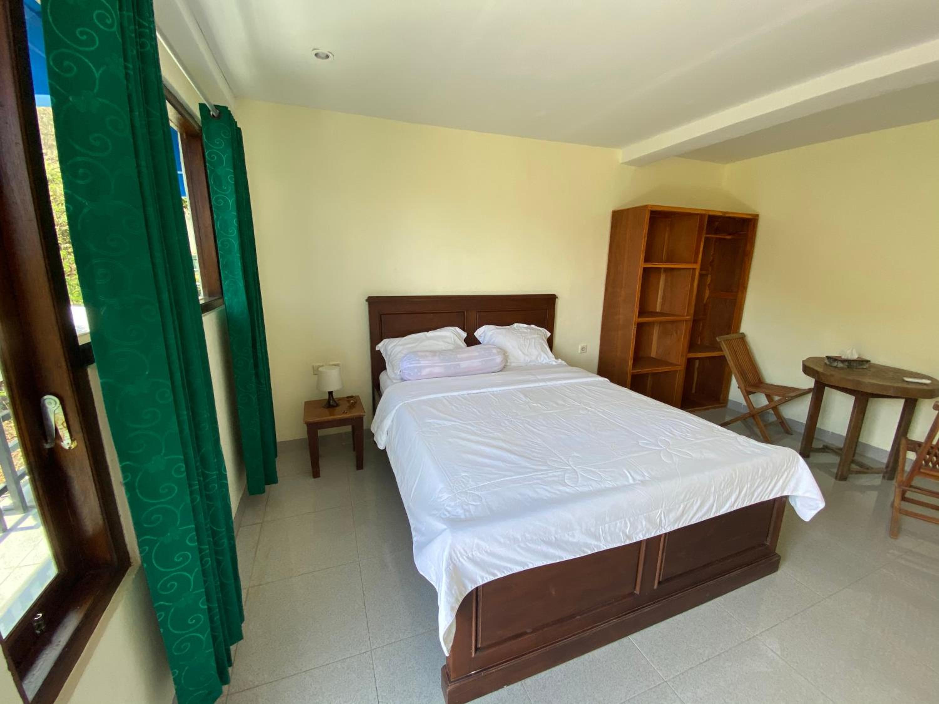 Deluxe Room - Photo 13