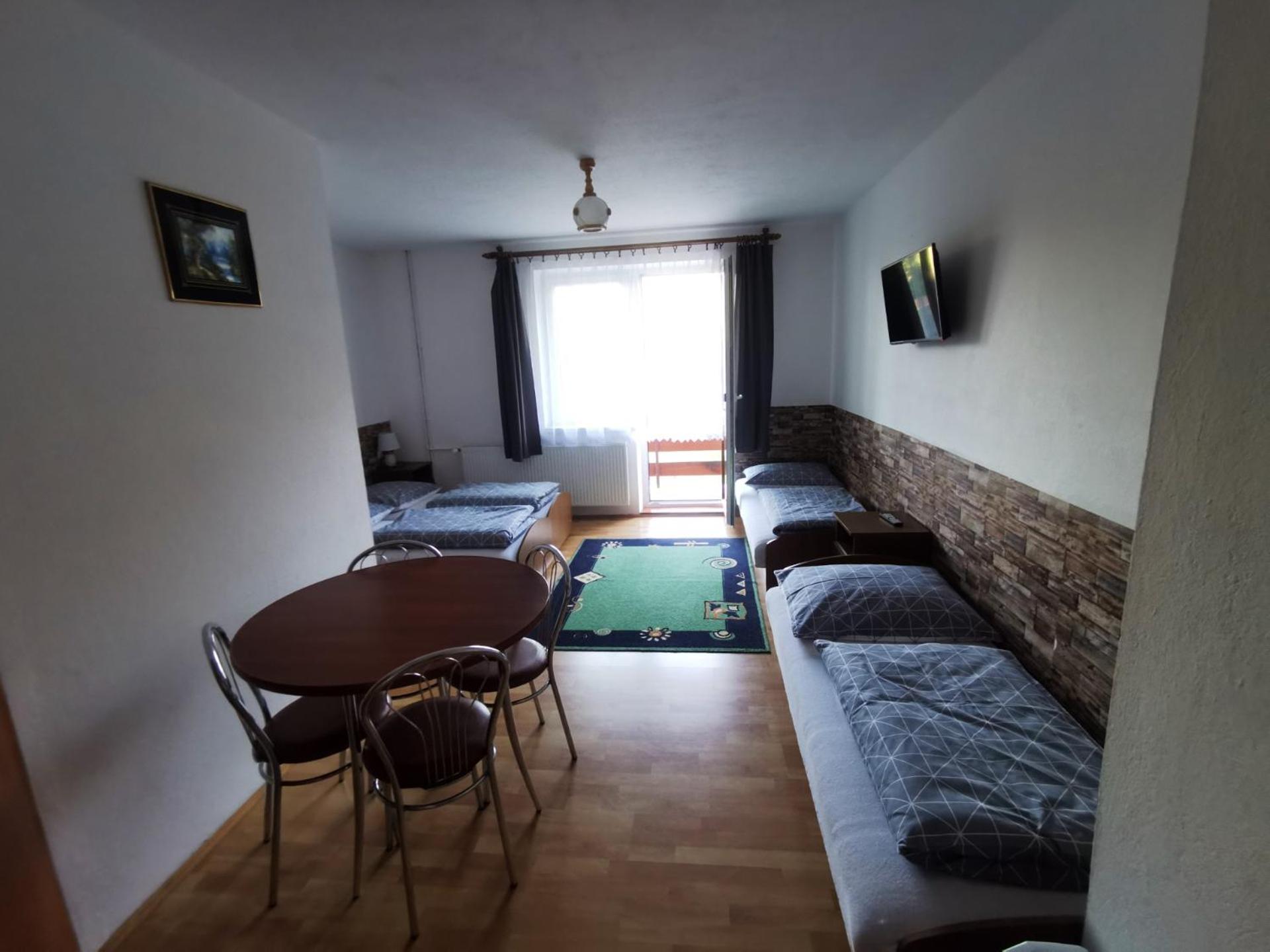 Quadruple Room with Private Bathroom photo 1