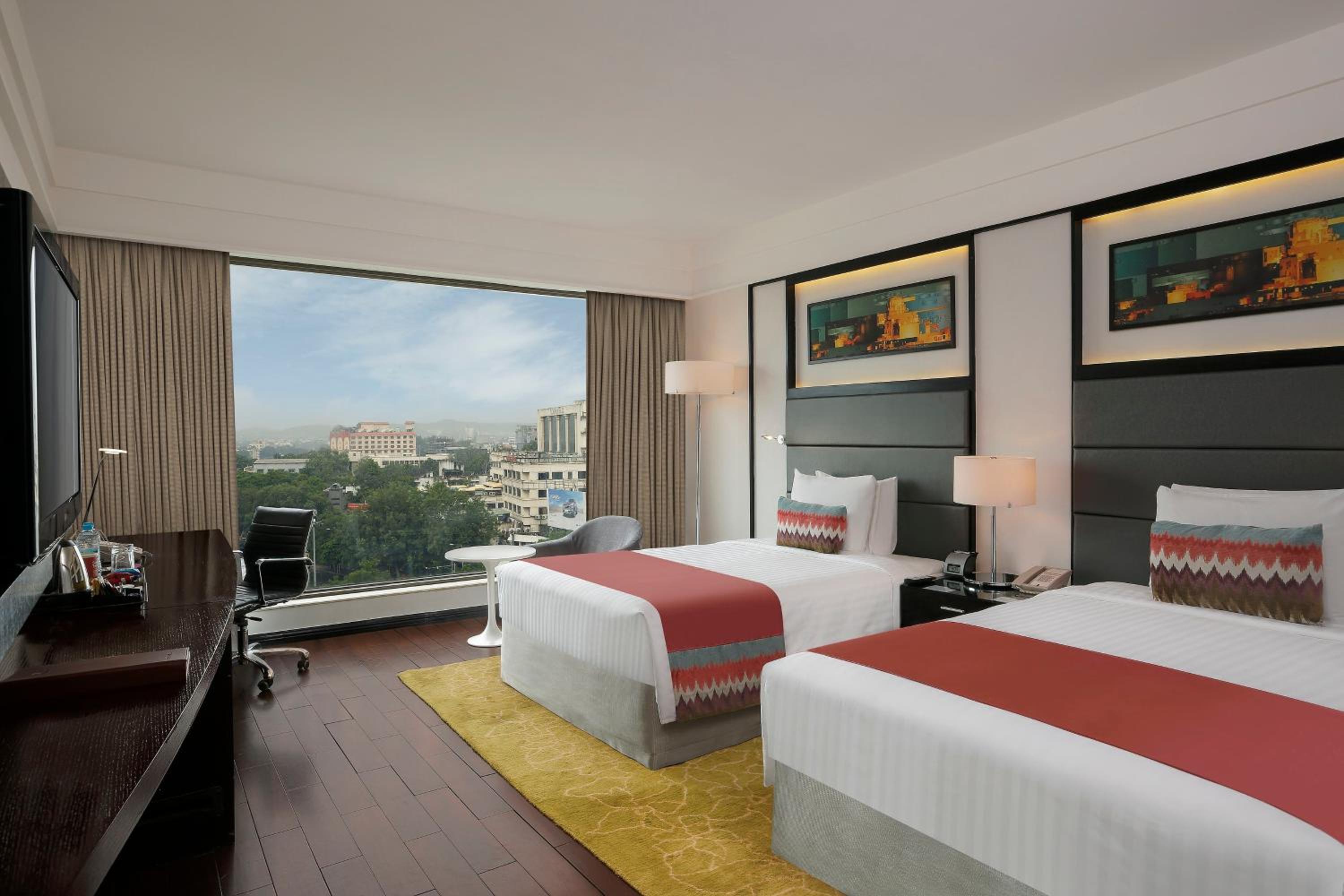 Deluxe Room with Two Single Beds with 20% discount on Food & Beverage , Laundry and Spa