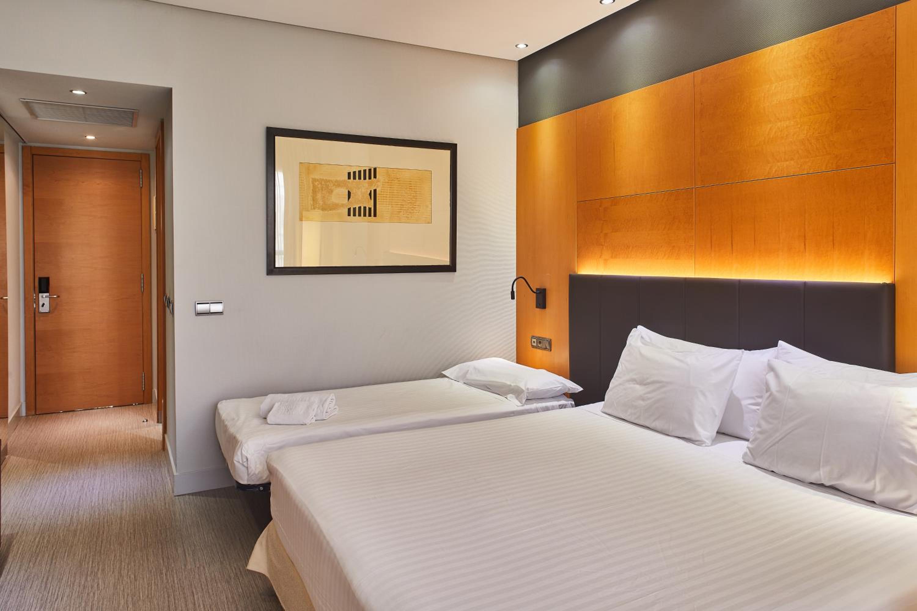 Habitación Doble o con Dos Camas con Cama Extra (2 Adultos + 1 Niño)