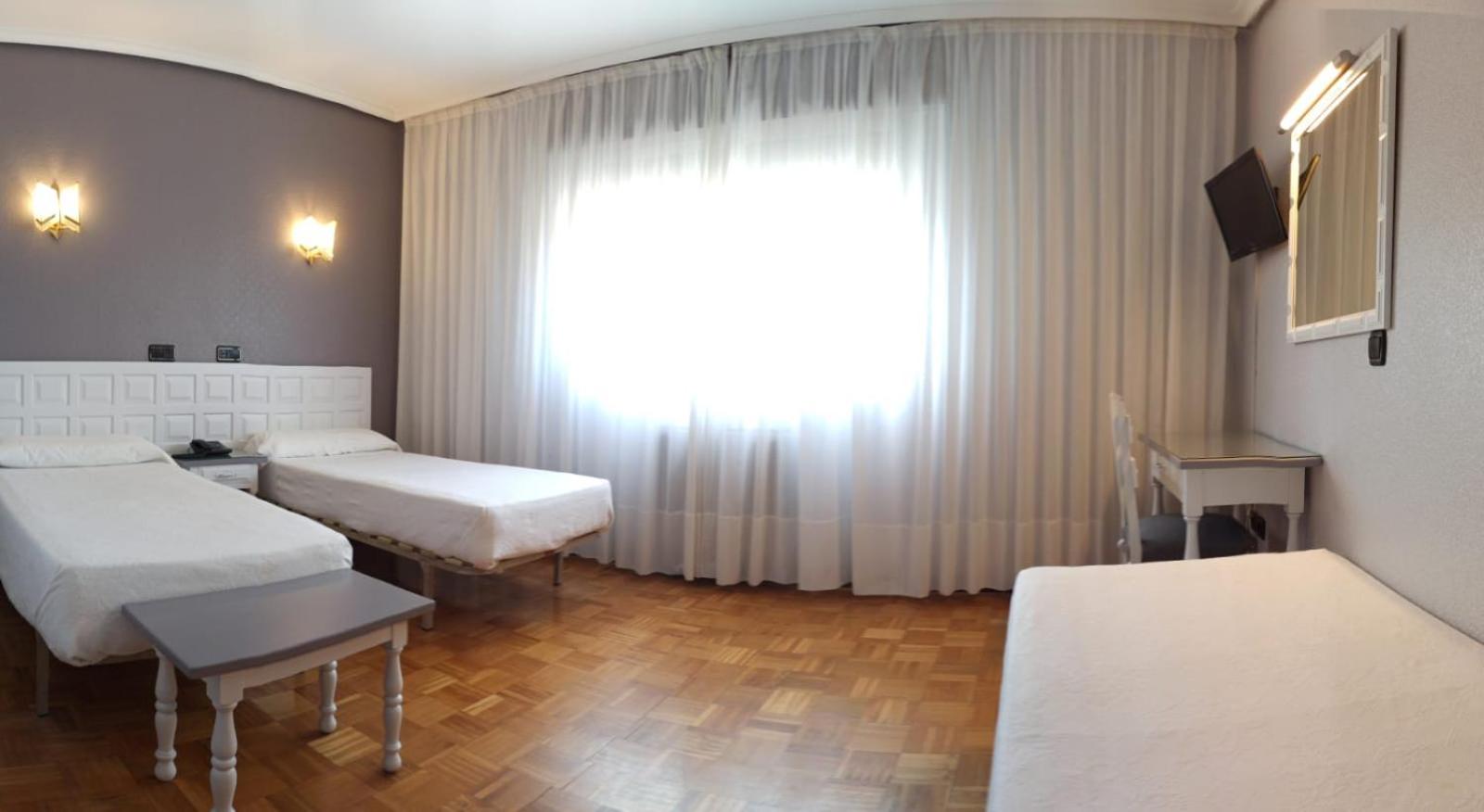 Triple Room - Photo 1