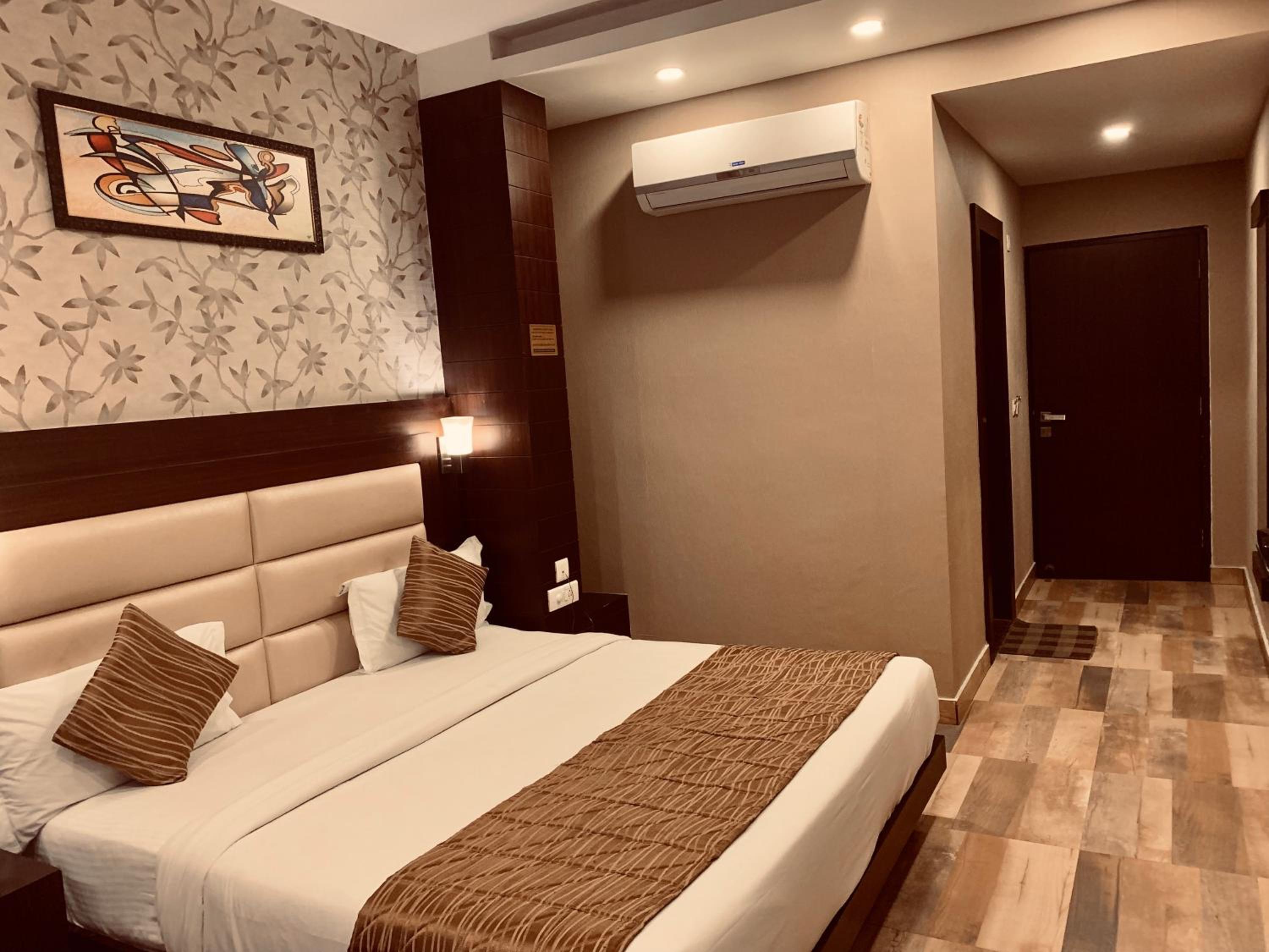 Deluxe Room - Photo 1