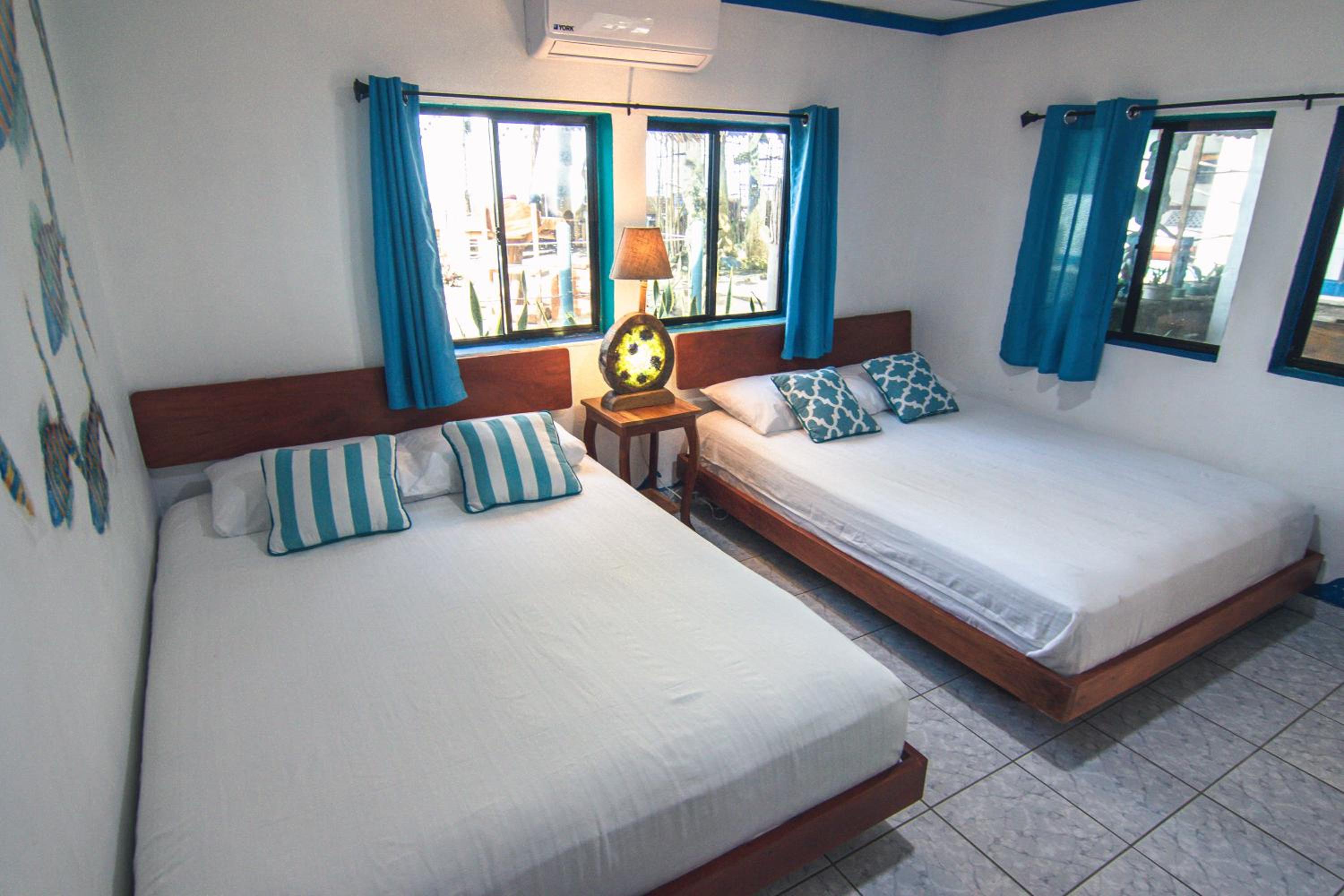 Standard Queen Room with Two Queen Beds photo 2